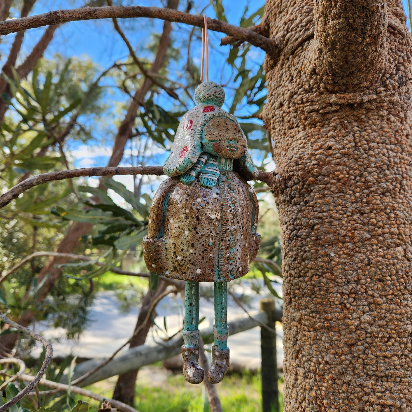 Clay windchime, little girl,