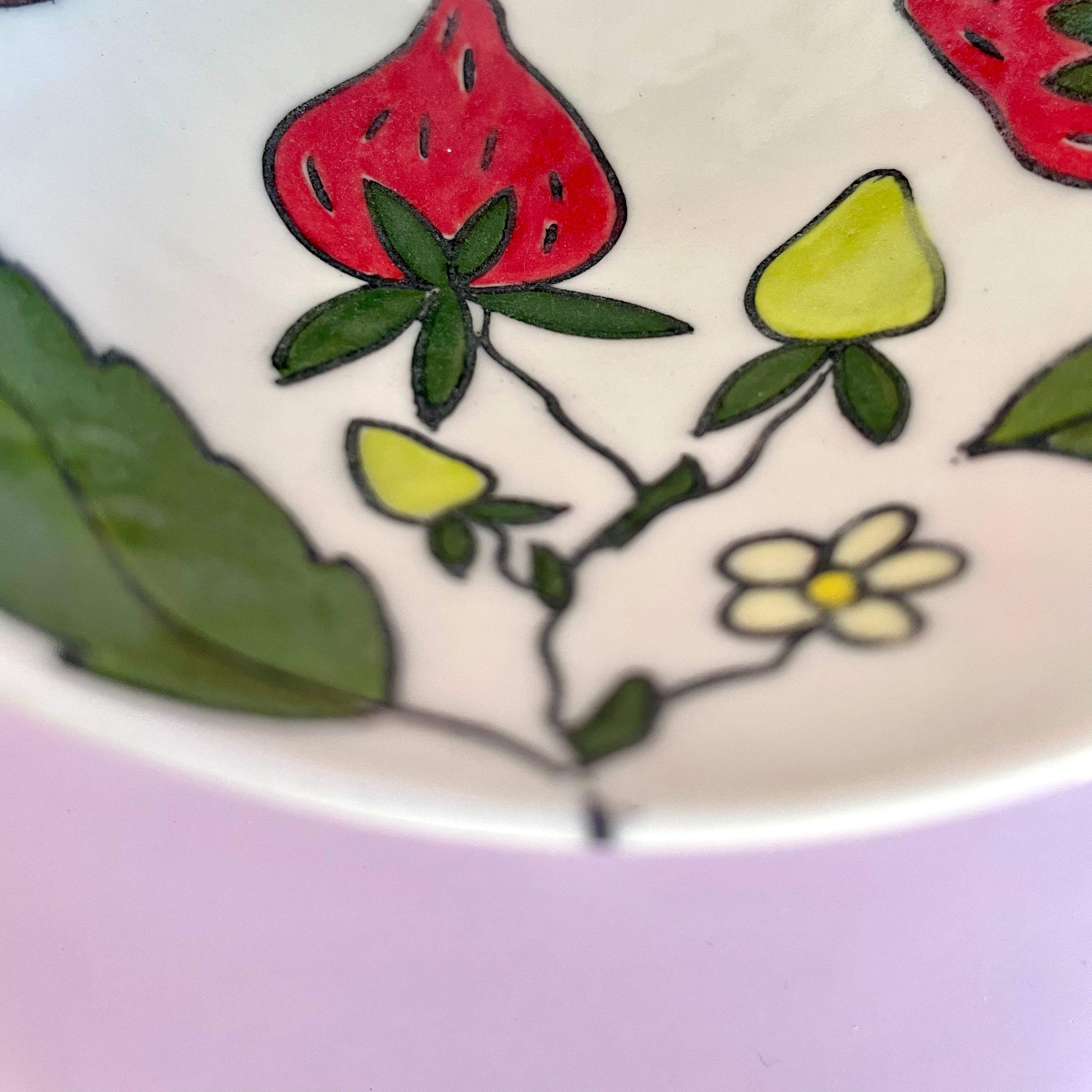 Small porcelain bowl with strawberry design