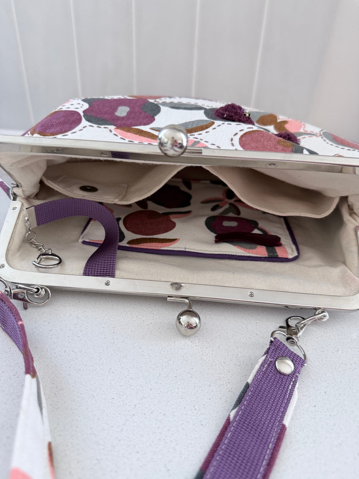 ‘Plum’ metal frame oversized purse