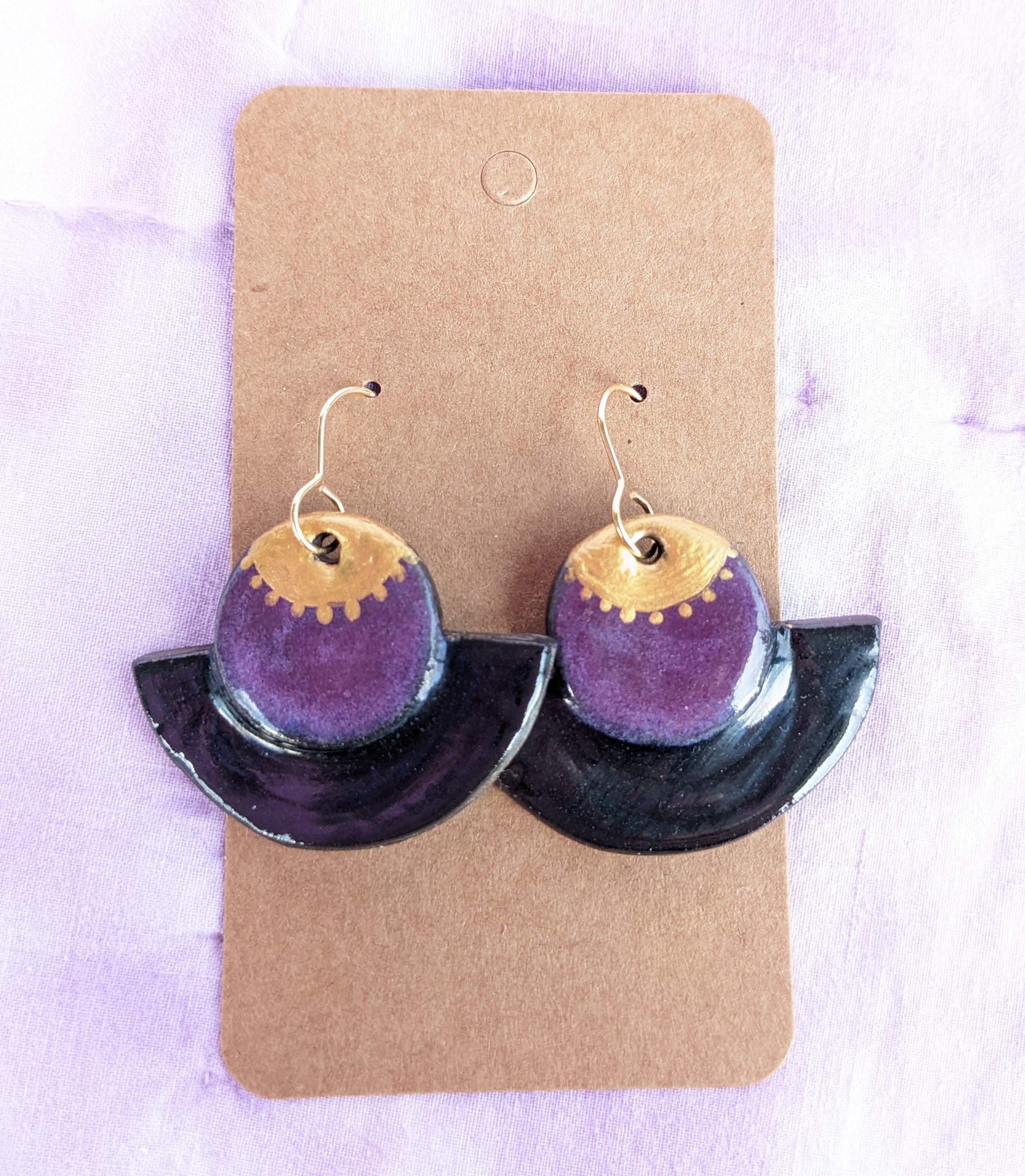 Black, Gold and Purple lightweight ceramic earrings.
