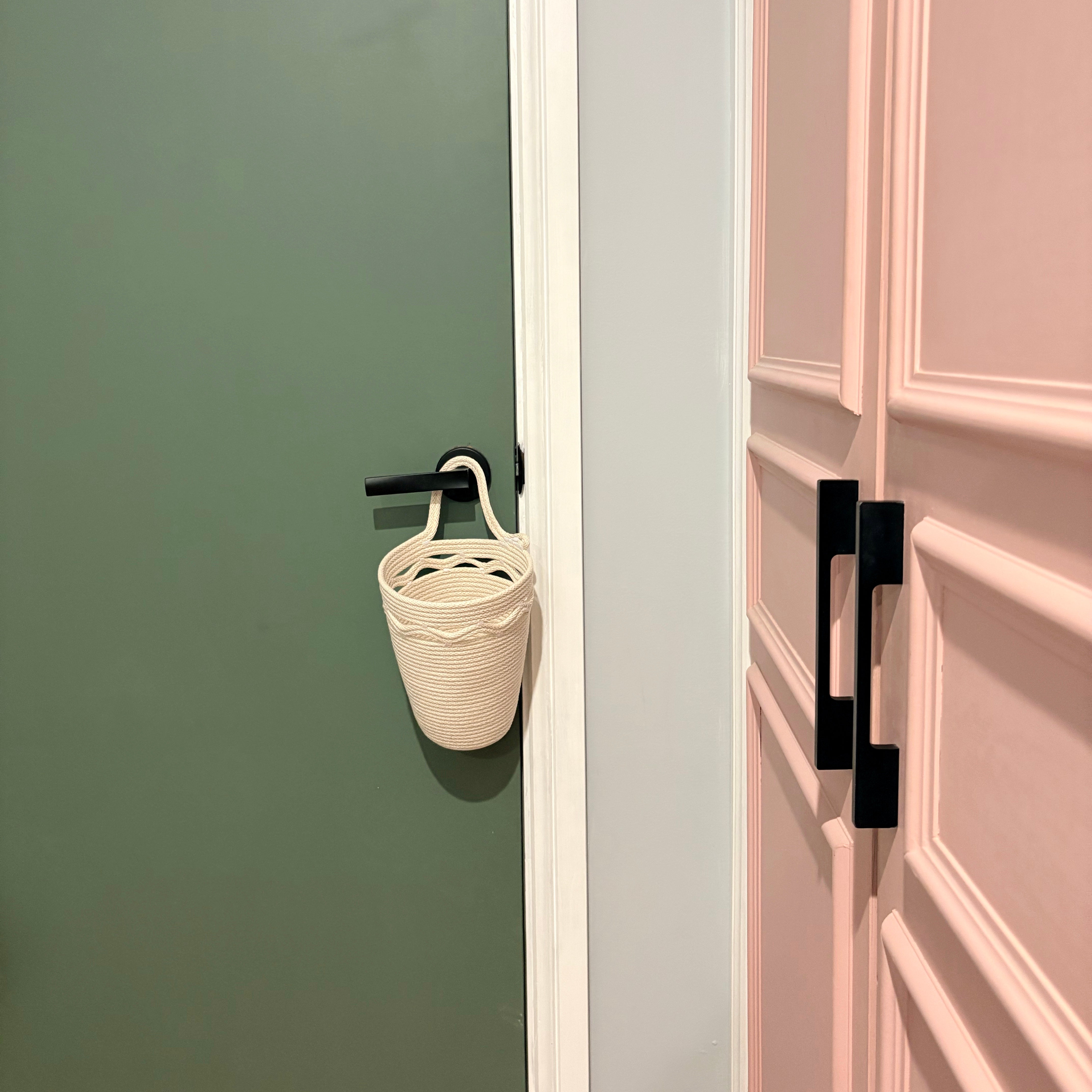 Hanging storage basket with wavy detail