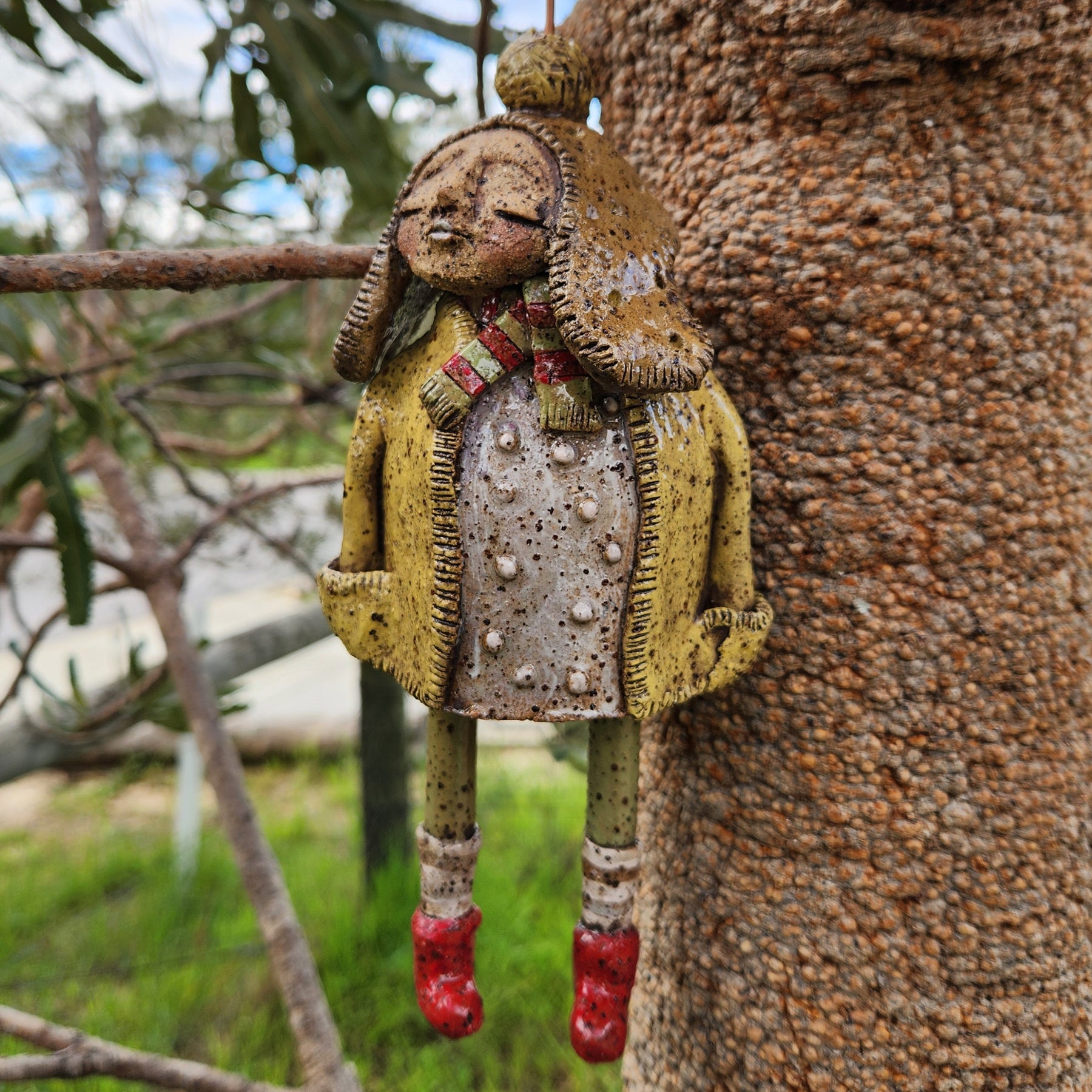 Handmade clay windchime, little girl