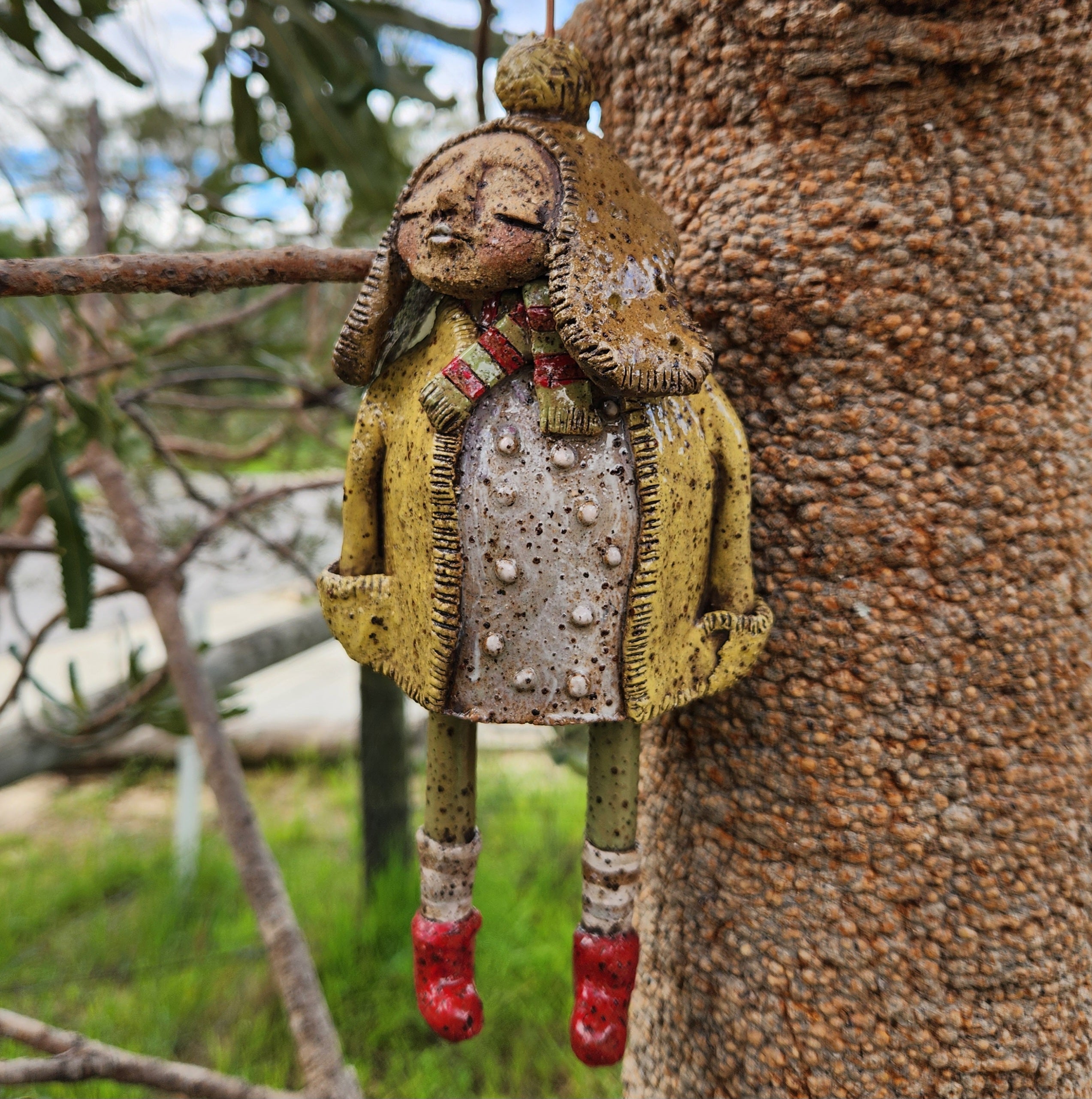 Handmade clay windchime, little girl