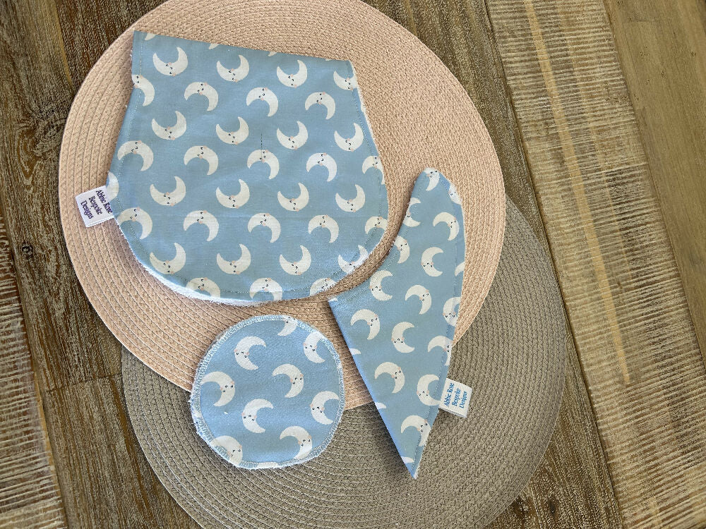 Bib, burp cloth and reusable breast pad set