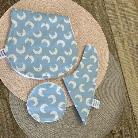 Bib, burp cloth and reusable breast pad set