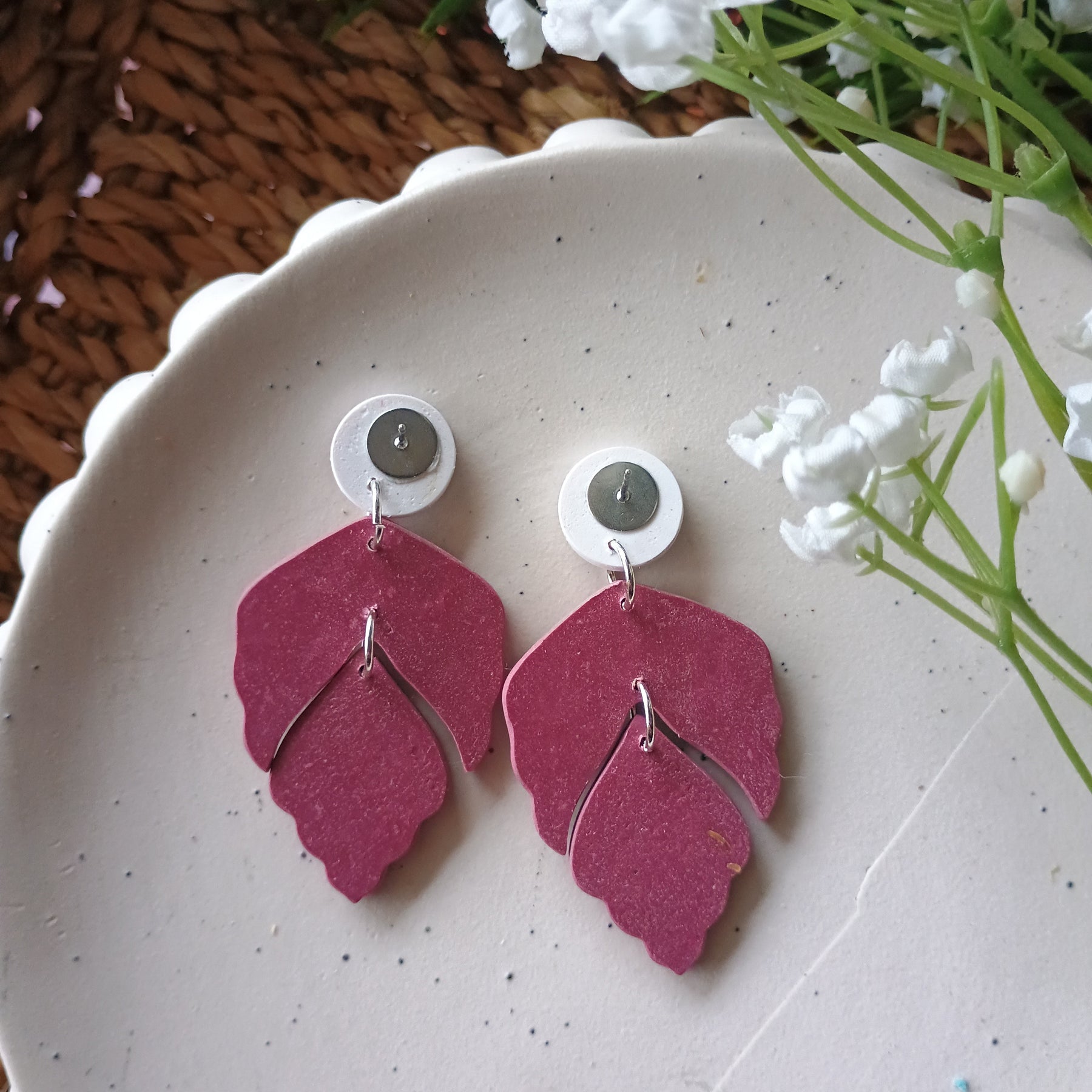 Plum coloured embossed leaf earrings with silkscreen painted stud