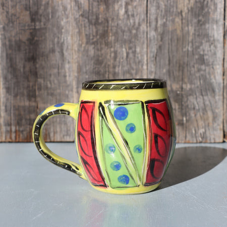 Hand-Painted Mug: Abstract yellow, red, green, black and blue mid-fire stoneware