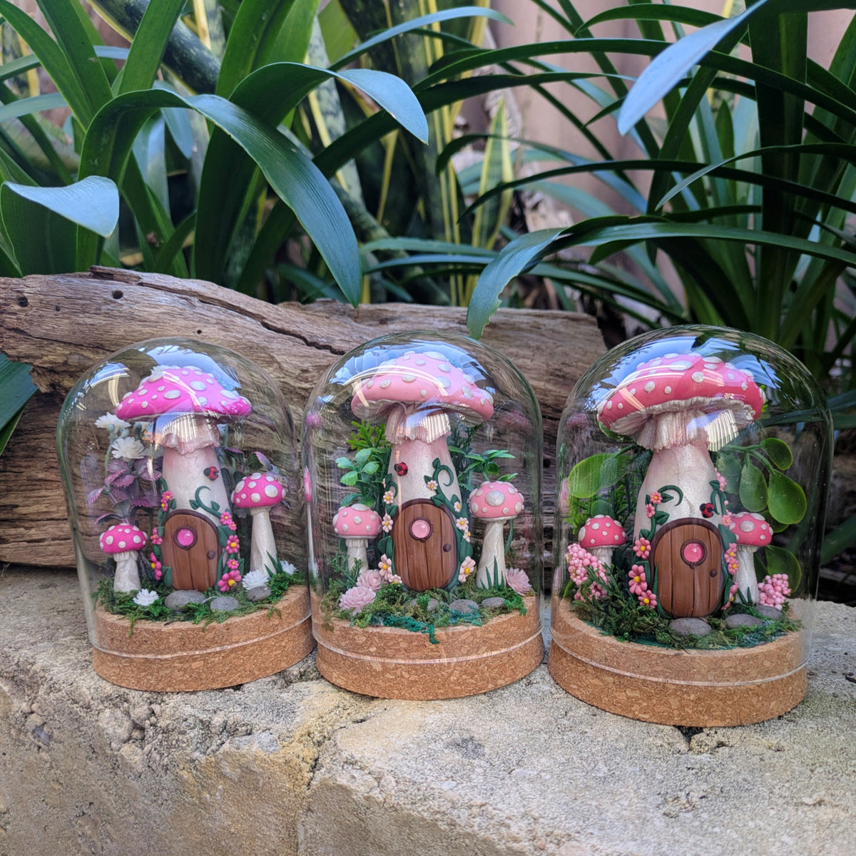 Pink Fairy Mushroom Houses in glass domes