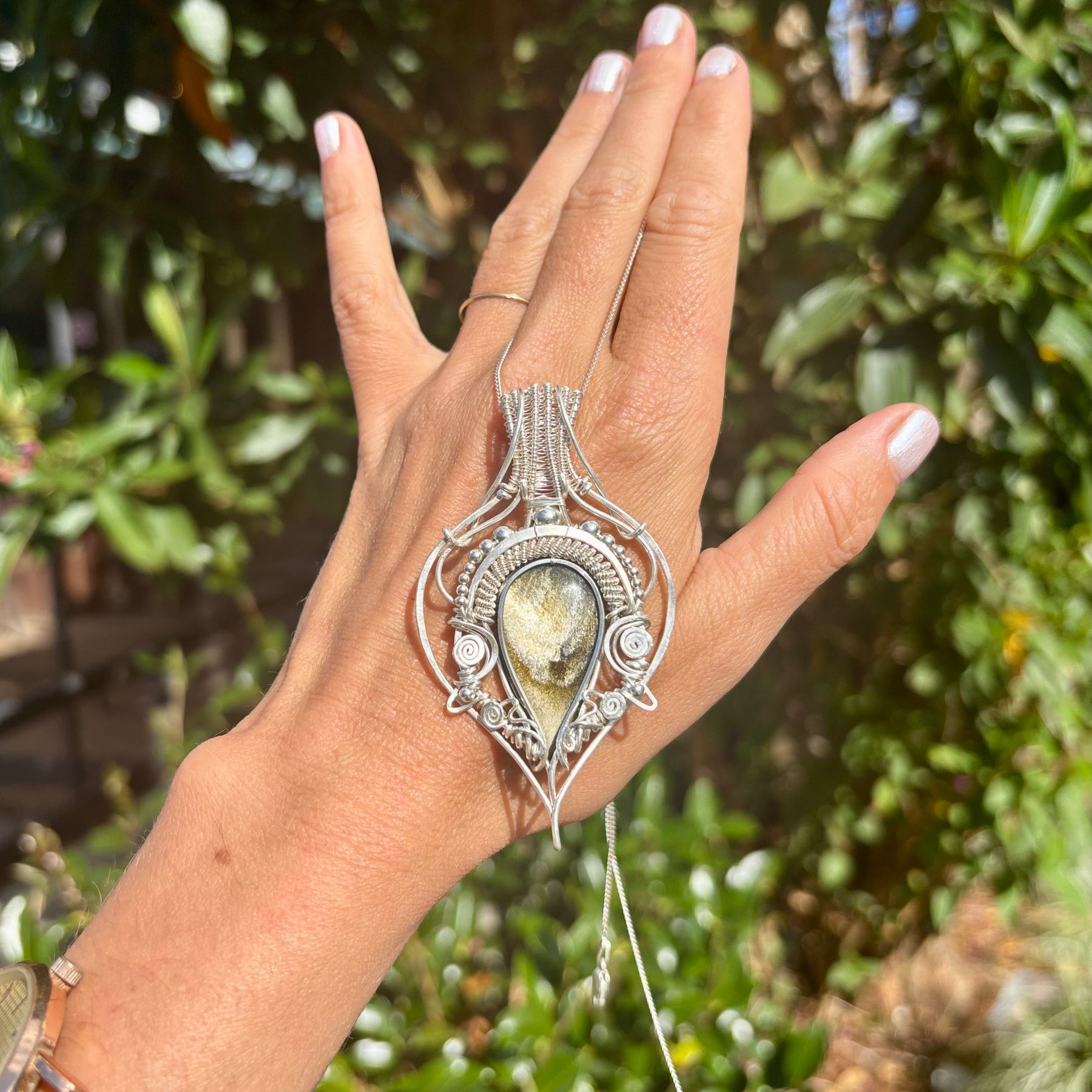Golden sheen obsidian crystal pendant creation