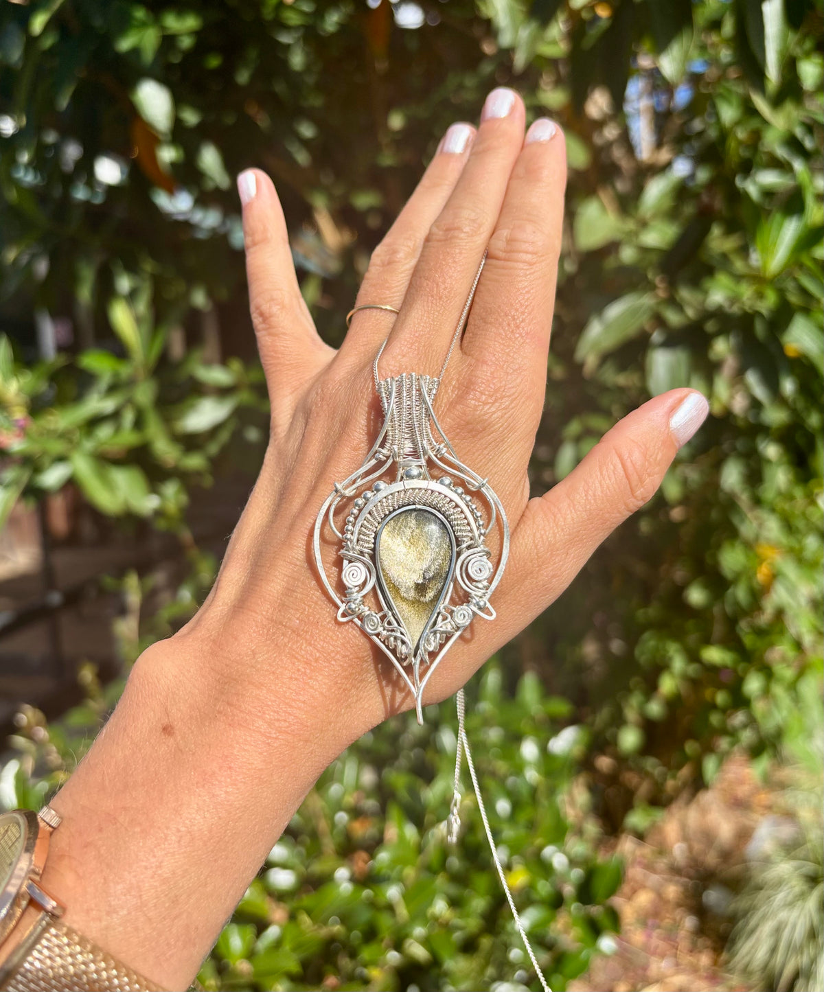 Golden sheen obsidian crystal pendant creation