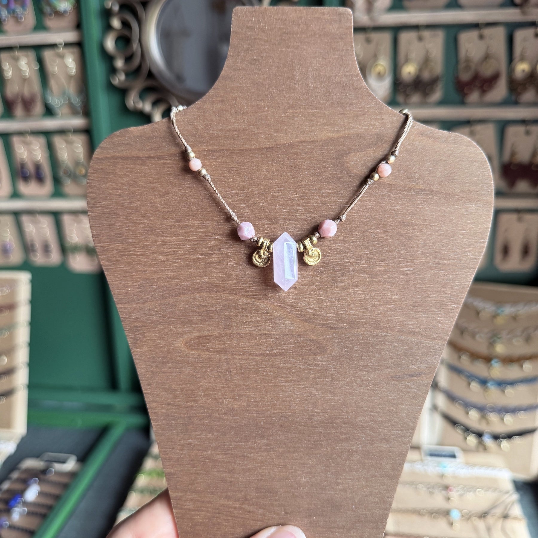 Crystal point necklace with faceted beads and solid brass charm