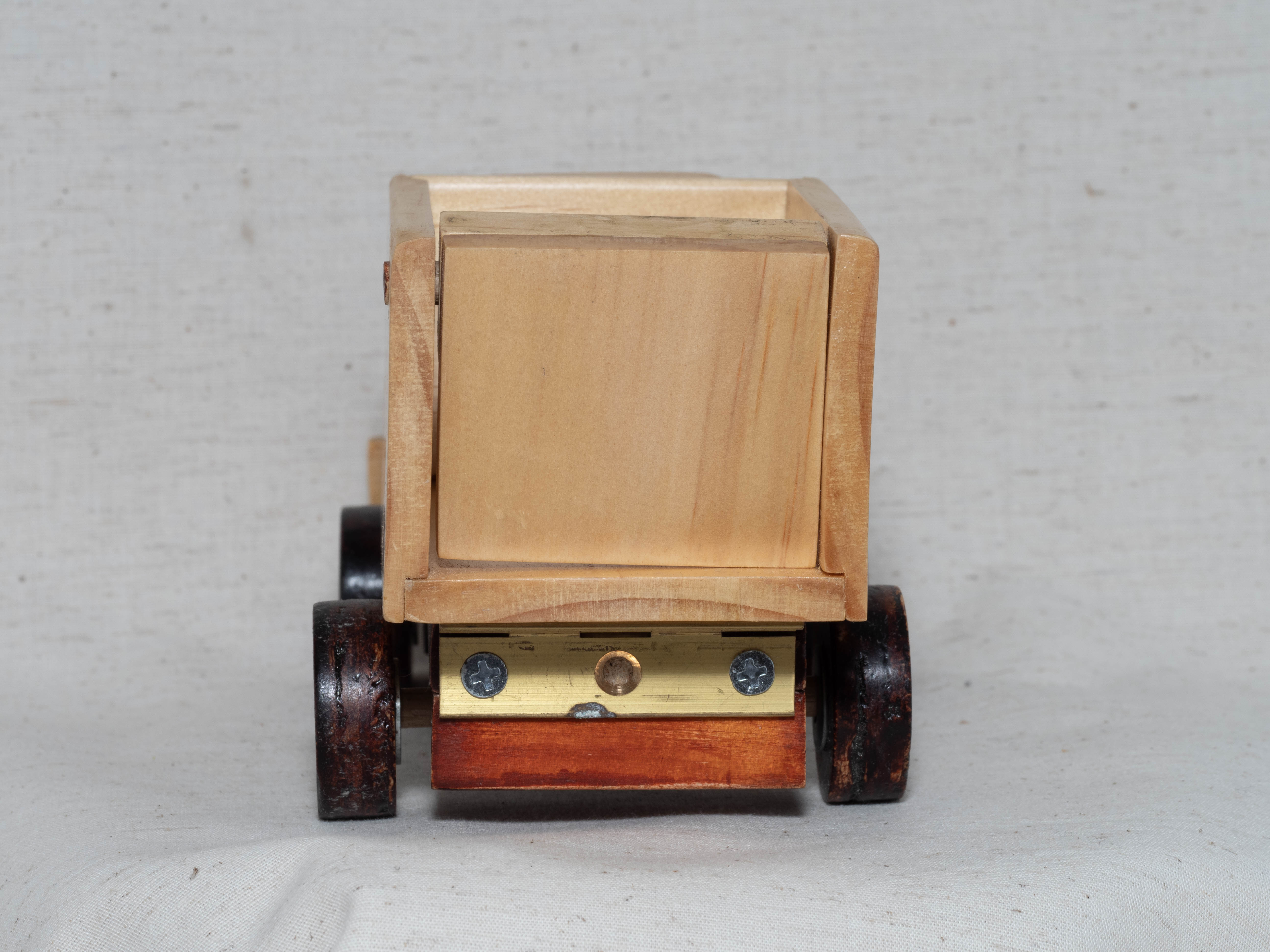 Wooden toy tip-truck