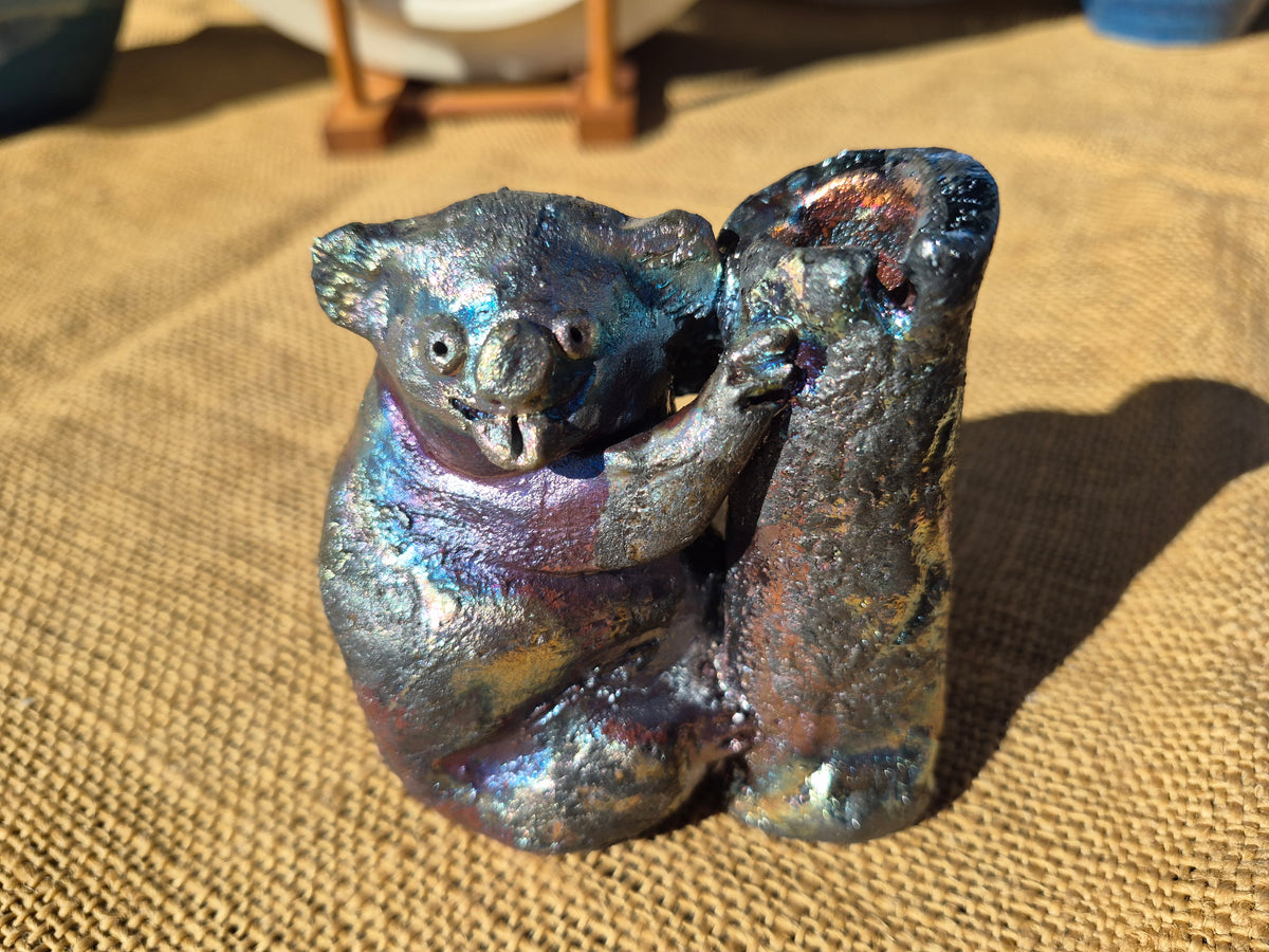 Raku Koala Sculpture: Blue Pink Silver Lustred Sculpture Poking Out His Tongue