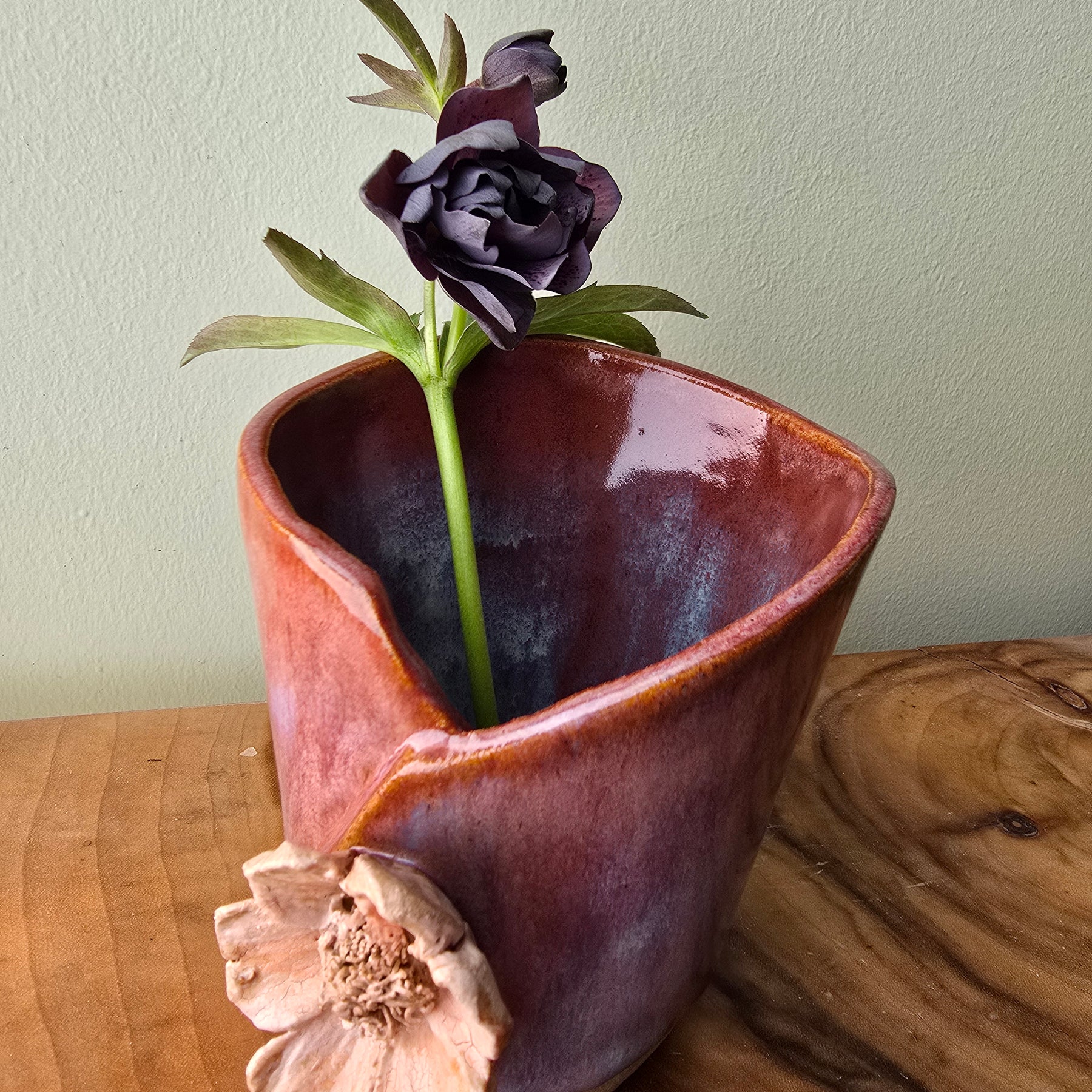 Simple pink vase with flower