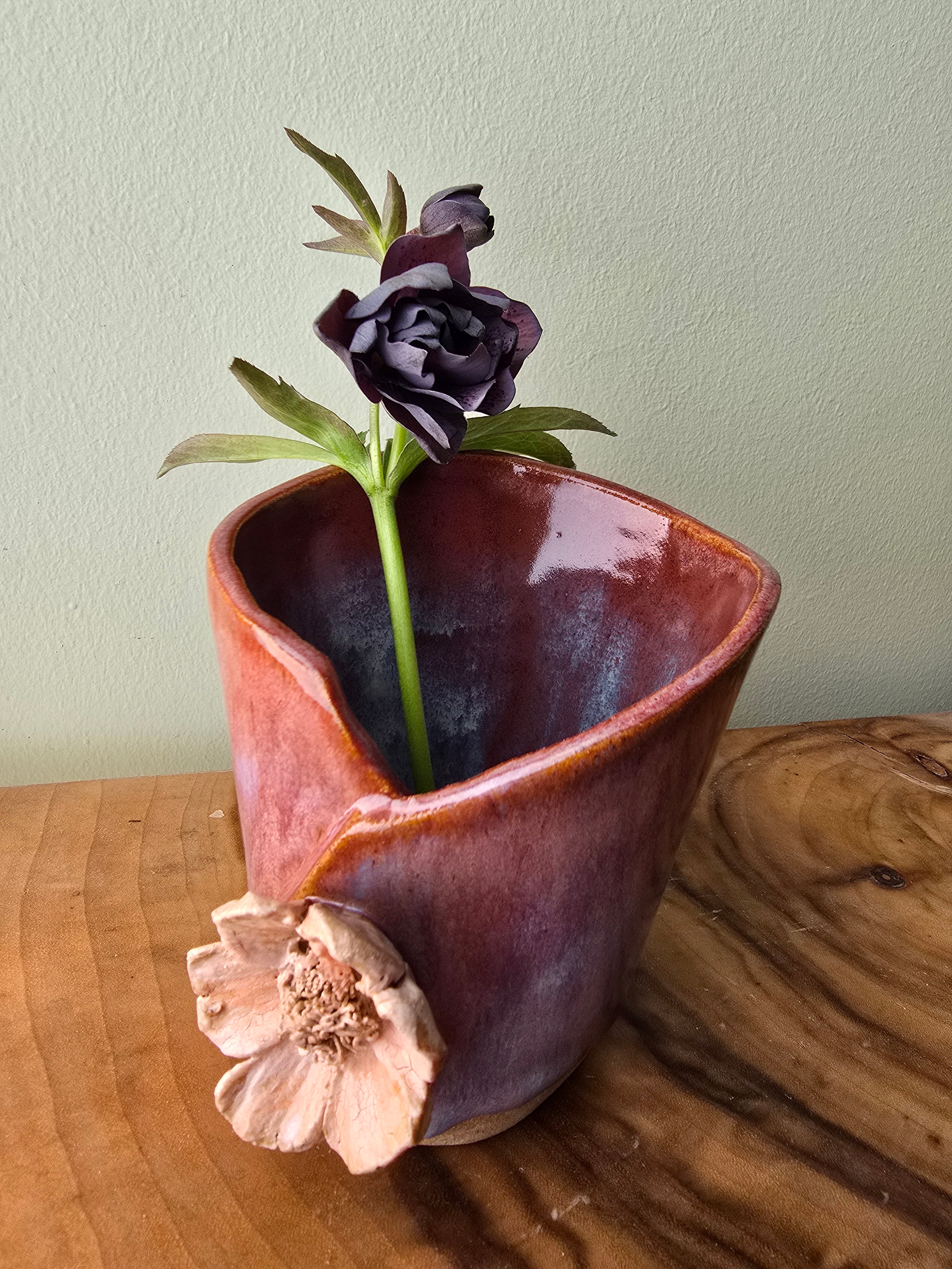 Simple pink vase with flower
