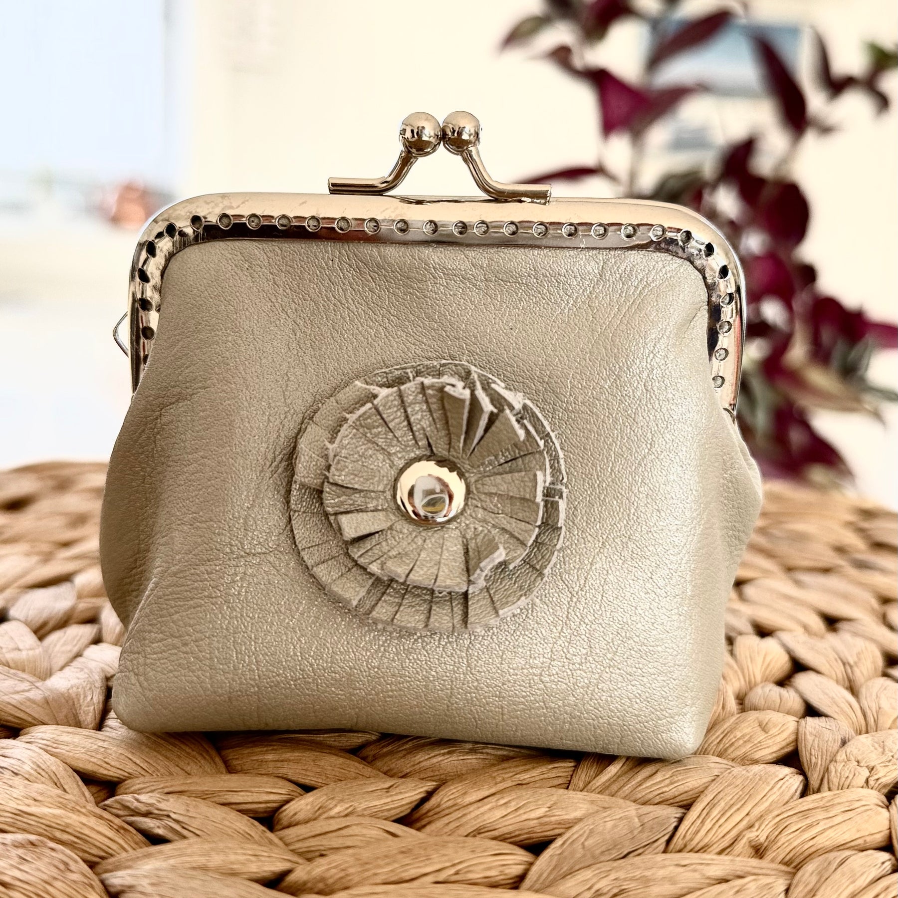Coin purse with rosette flower accent