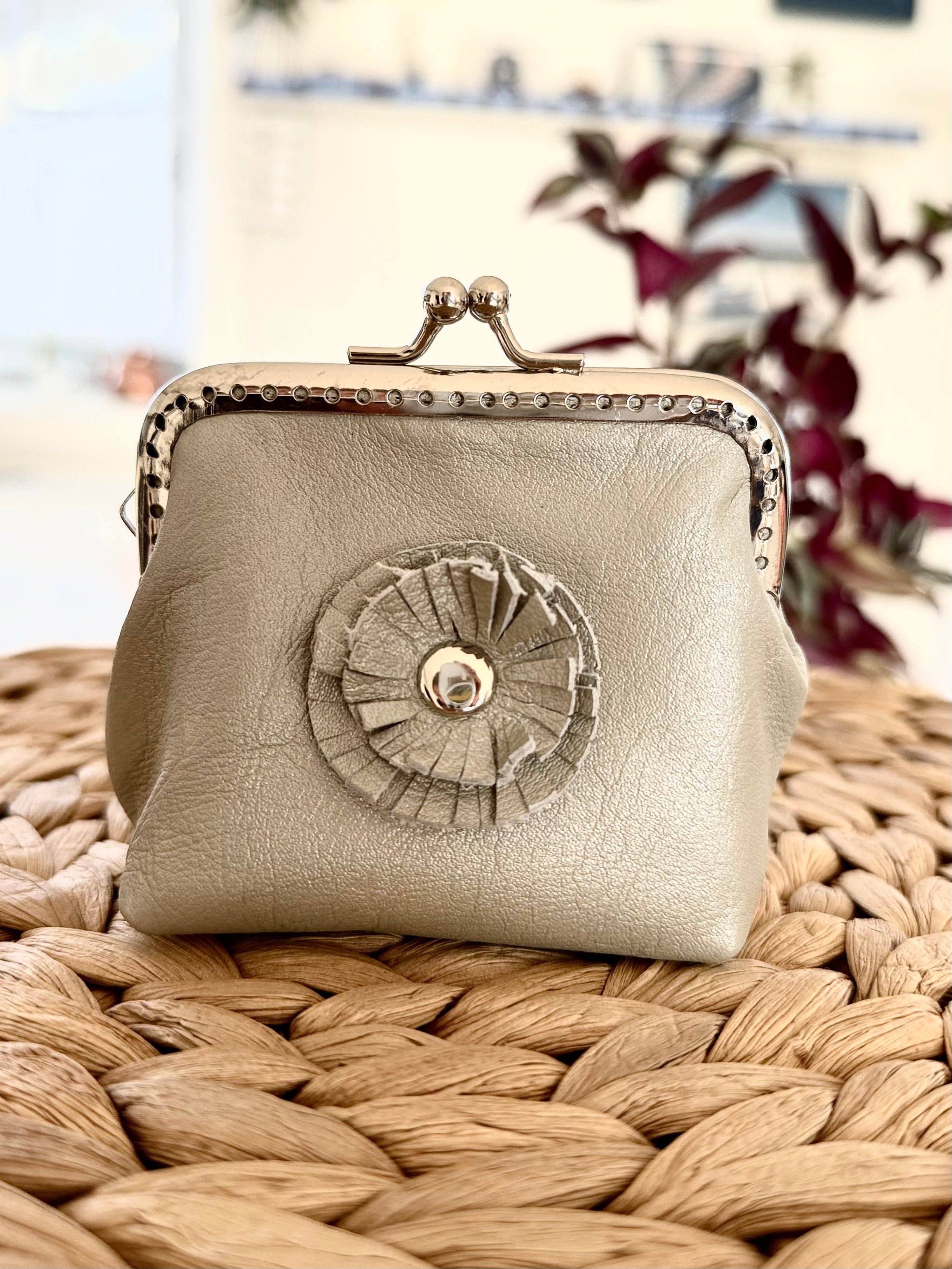 Coin purse with rosette flower accent