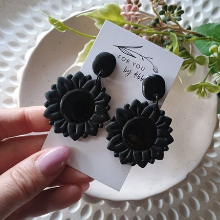 Blackened sunflower statement earrings