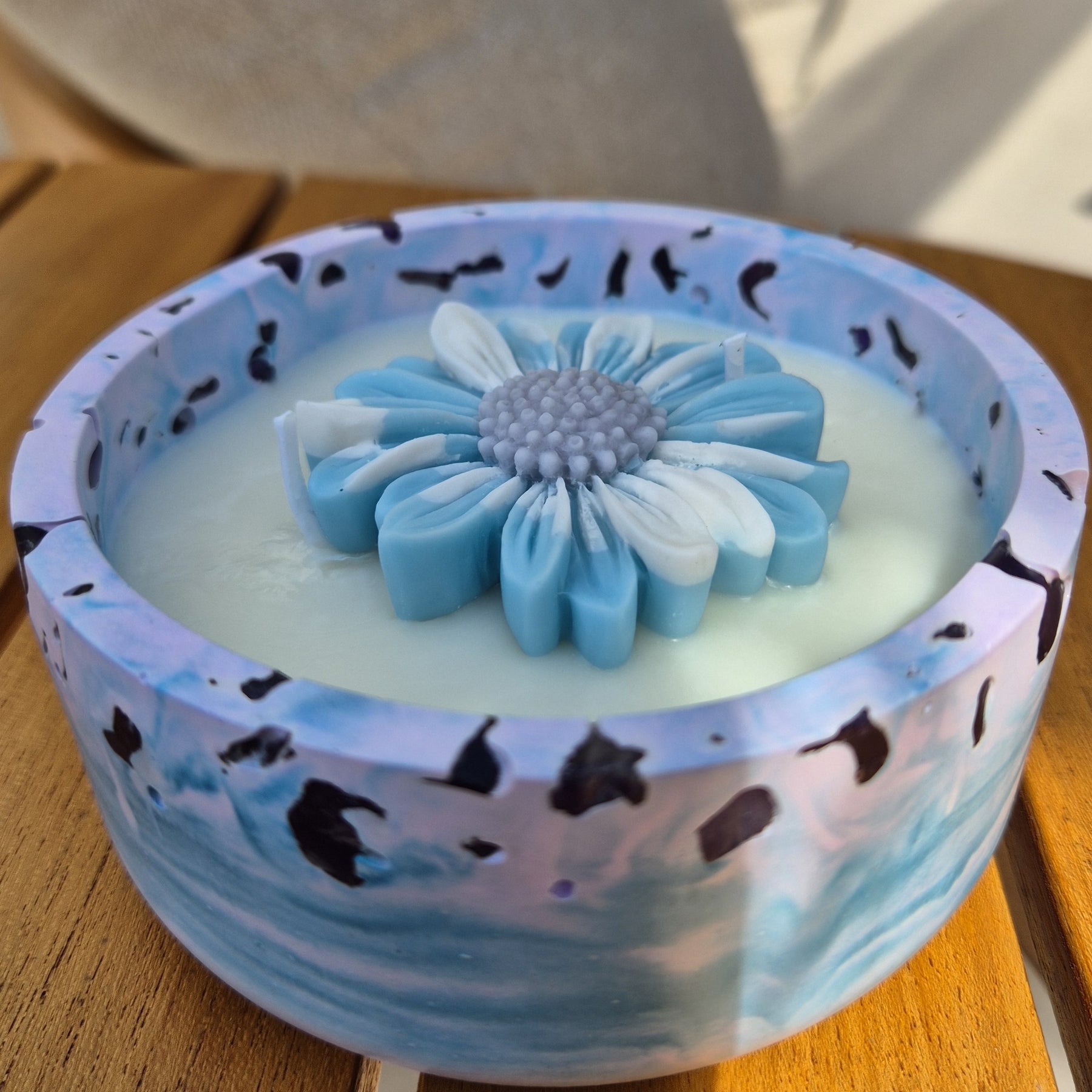 Round blue and purple concrete bowl candle with amethyst stones