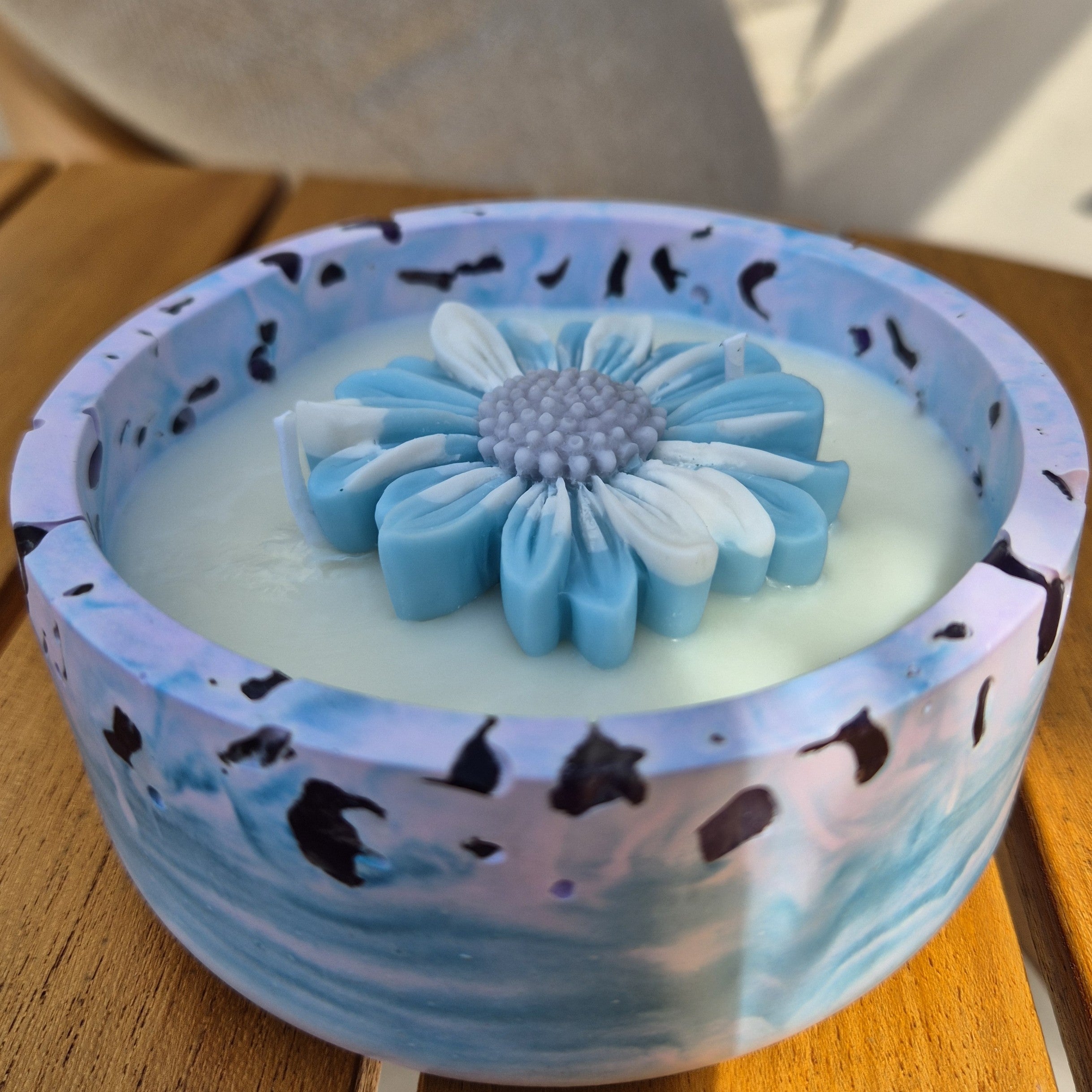 Round blue and purple concrete bowl candle with amethyst stones