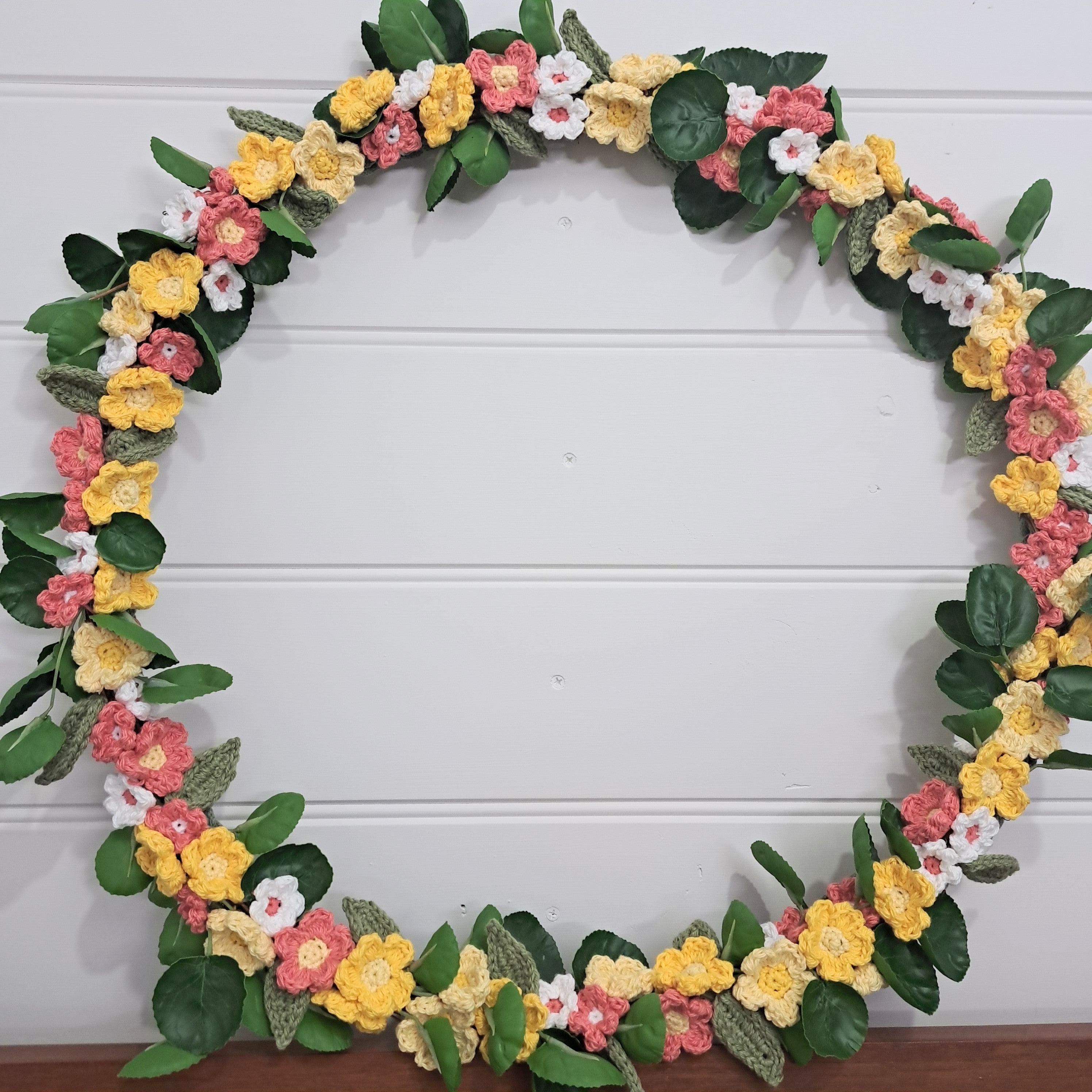 Handmade crochet spring flower wreath, yellows, pinks, white