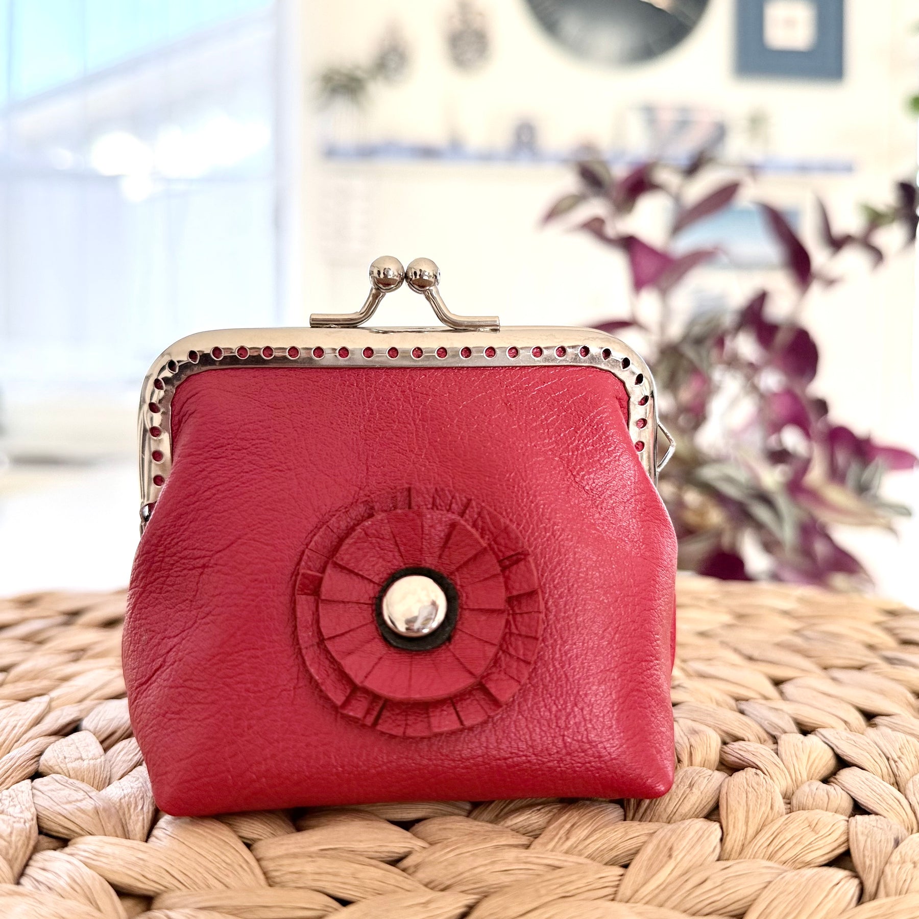 Coin purse with rosette flower accent