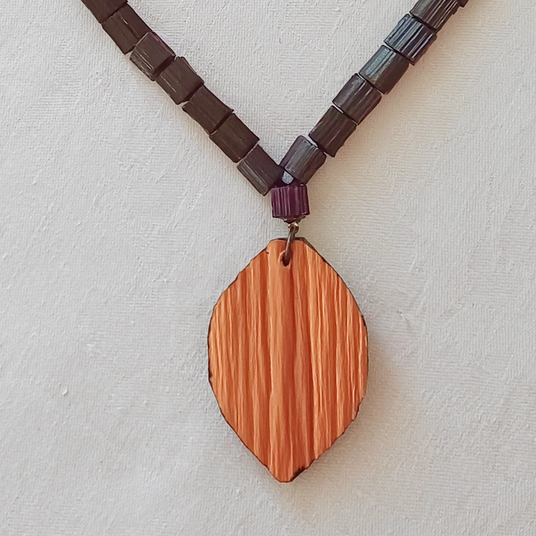 Hand painted Heart pendant on palm leaf bead necklace
