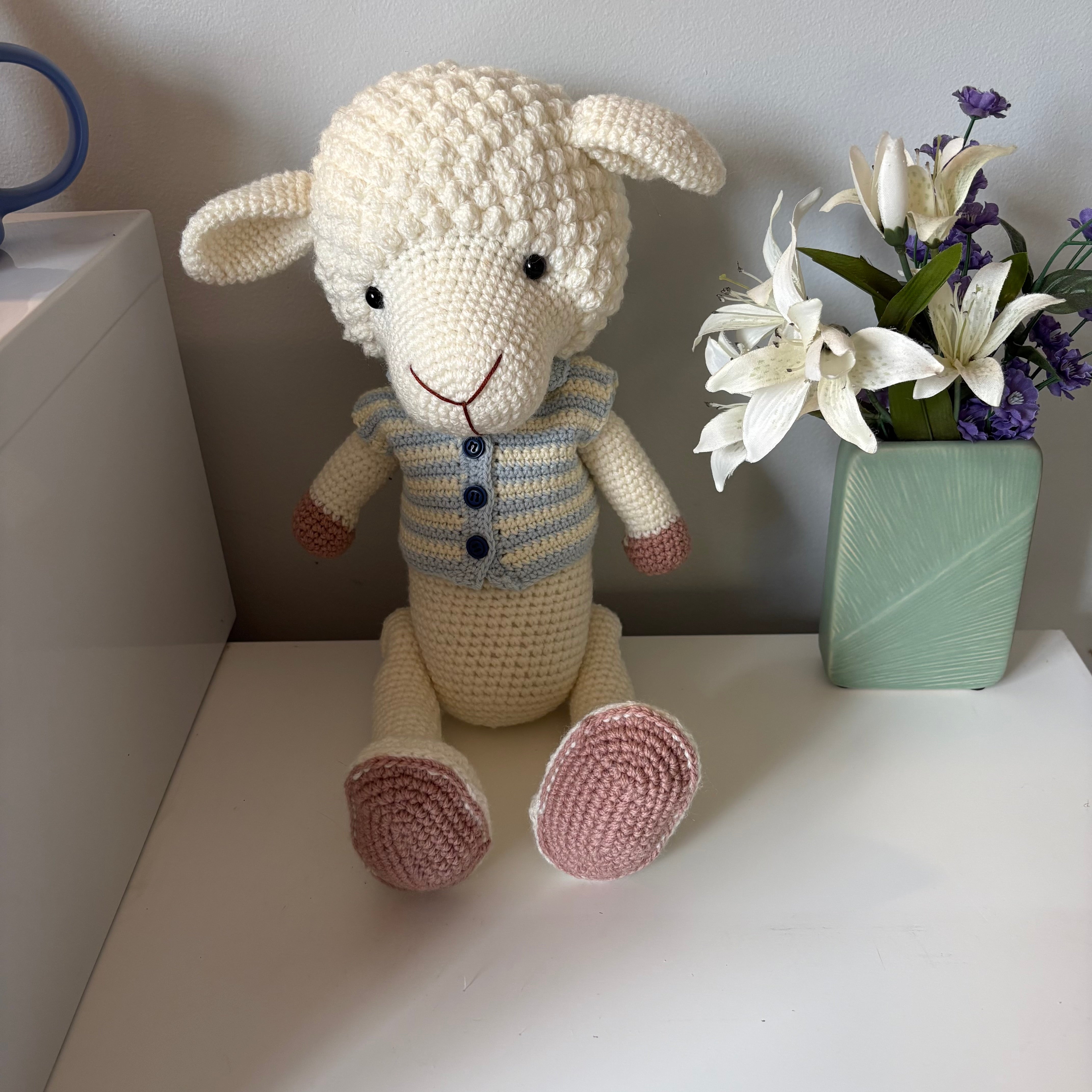 Lamb in overalls and hat