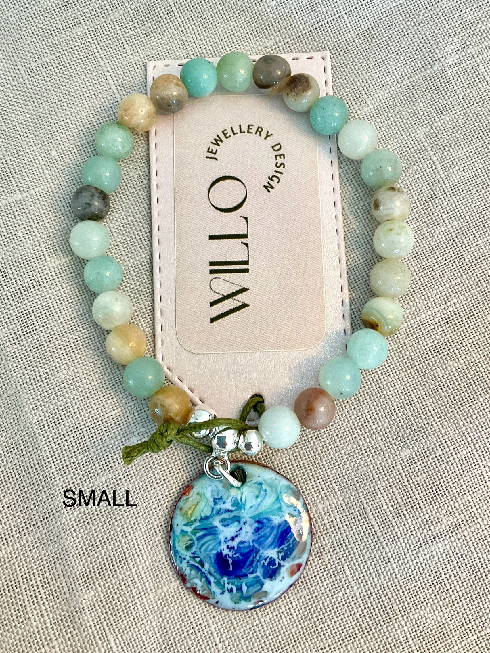 Amazonite gemstone bracelet with enamel charm.