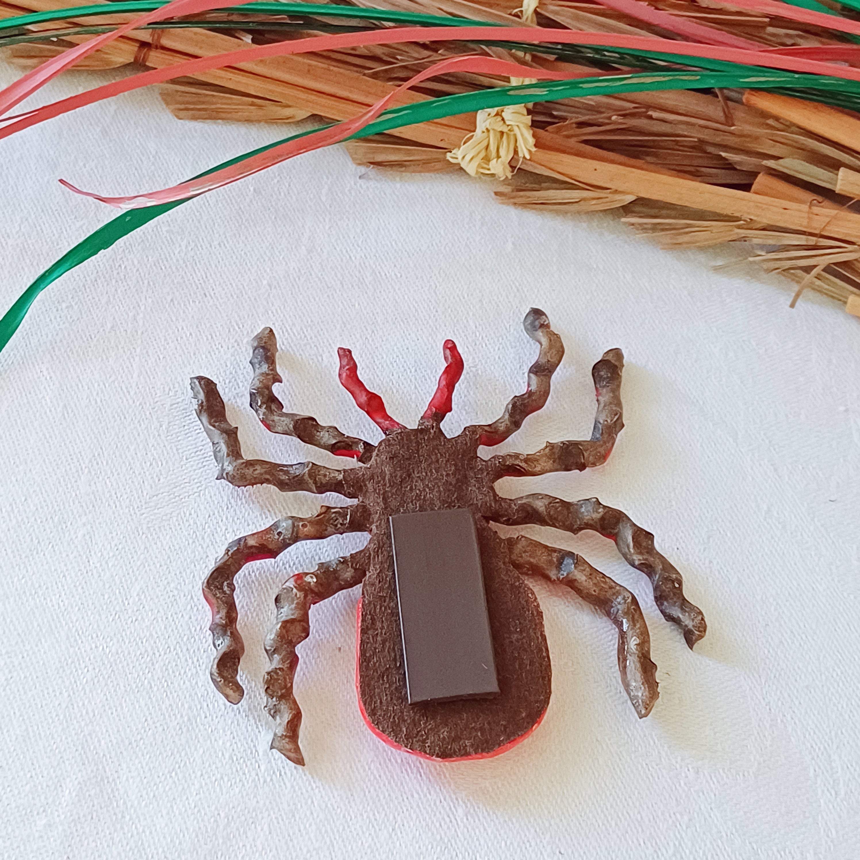 Hand painted red palm clay spider keepsake with magnet