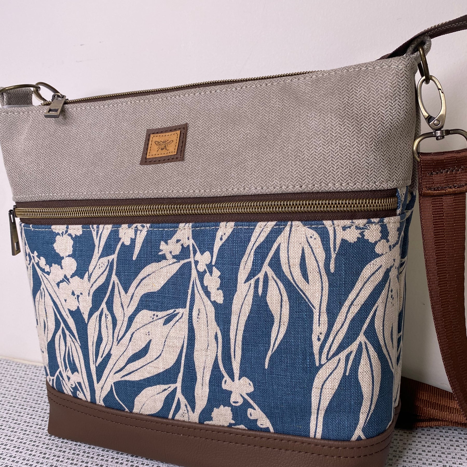 Lola Crossbody Bag - Hand Screen Printed Linen in Blue Gum leaves and Beige Fabric with Dark BrownFaux Leather Base