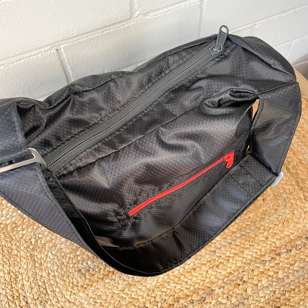 Sling bag with front pocket