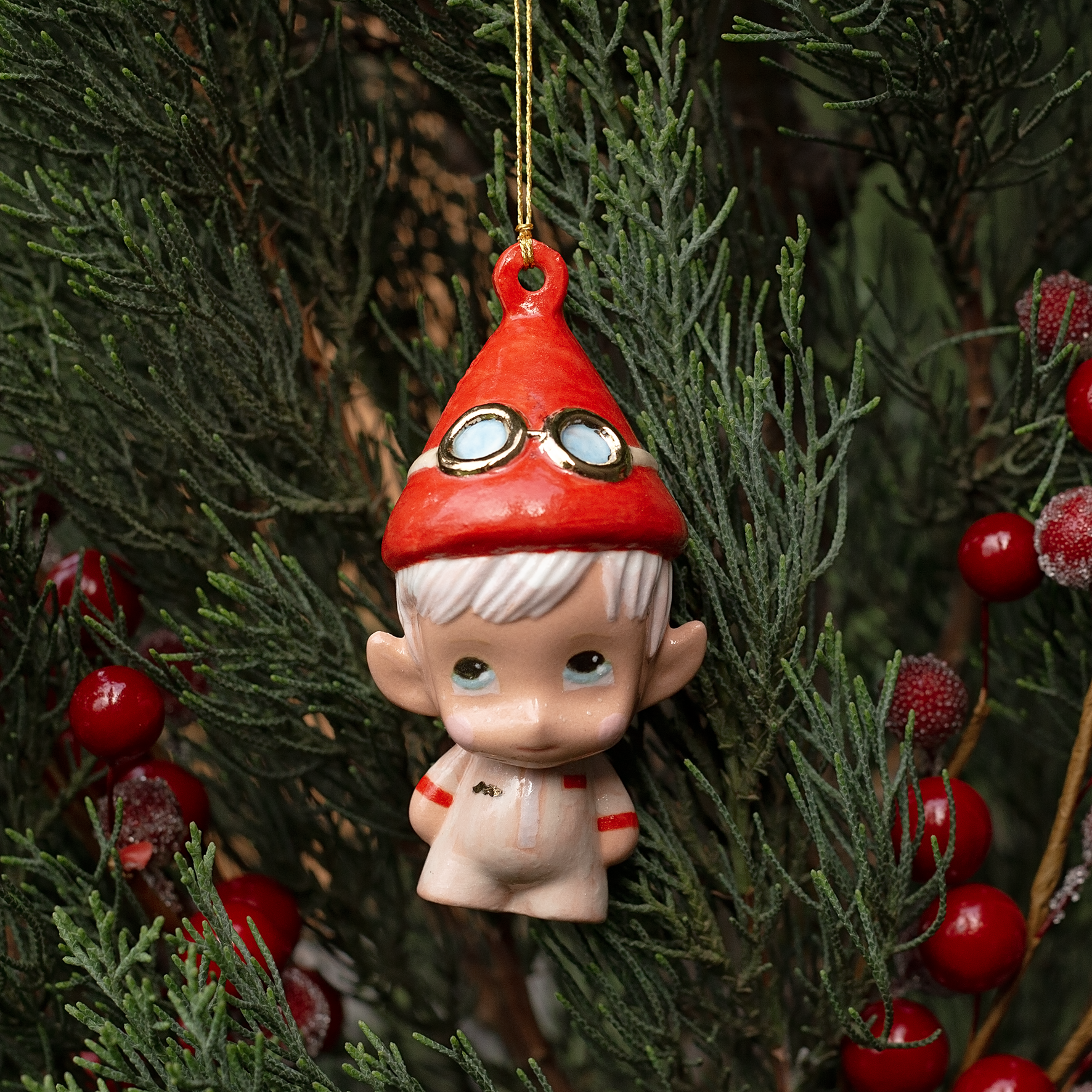 Handmade Porcelain Christmas ornament. One-of-a-kind. Zac, the sleigh mechanic Elf.