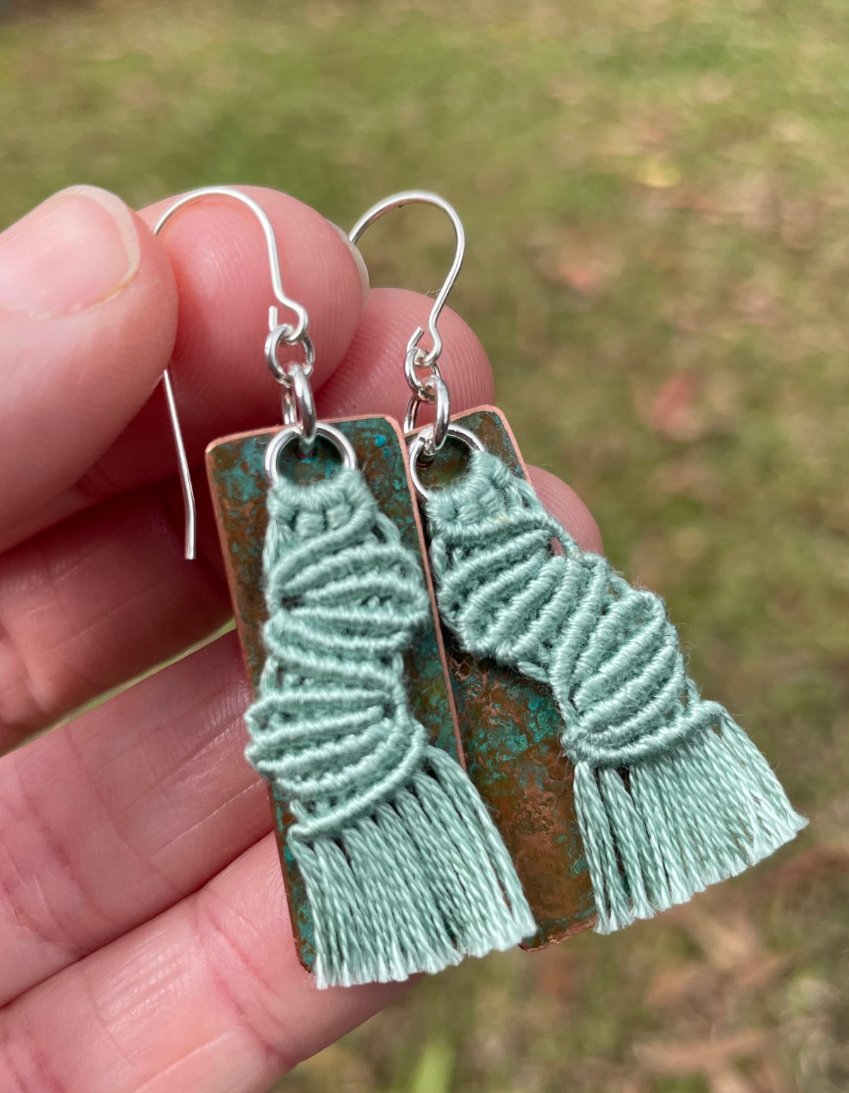 Sage green macrame thread on patinated copper