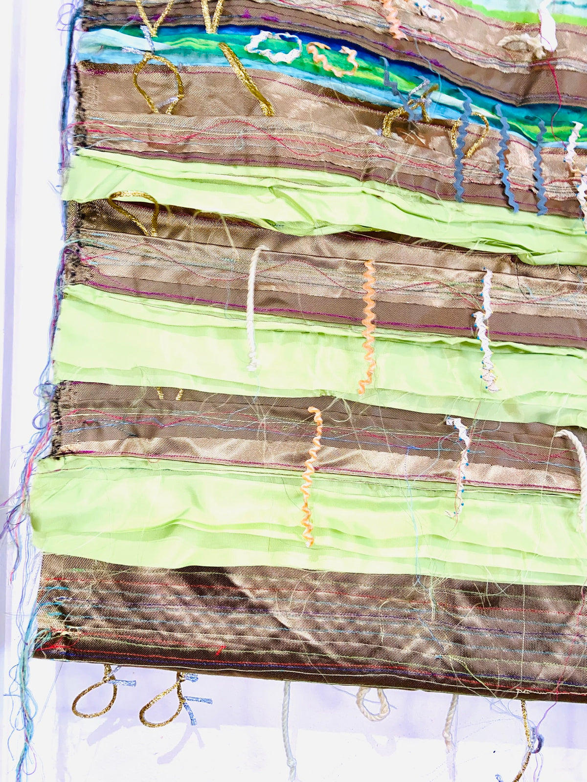 Green, Blue and Gold textile wall hanging