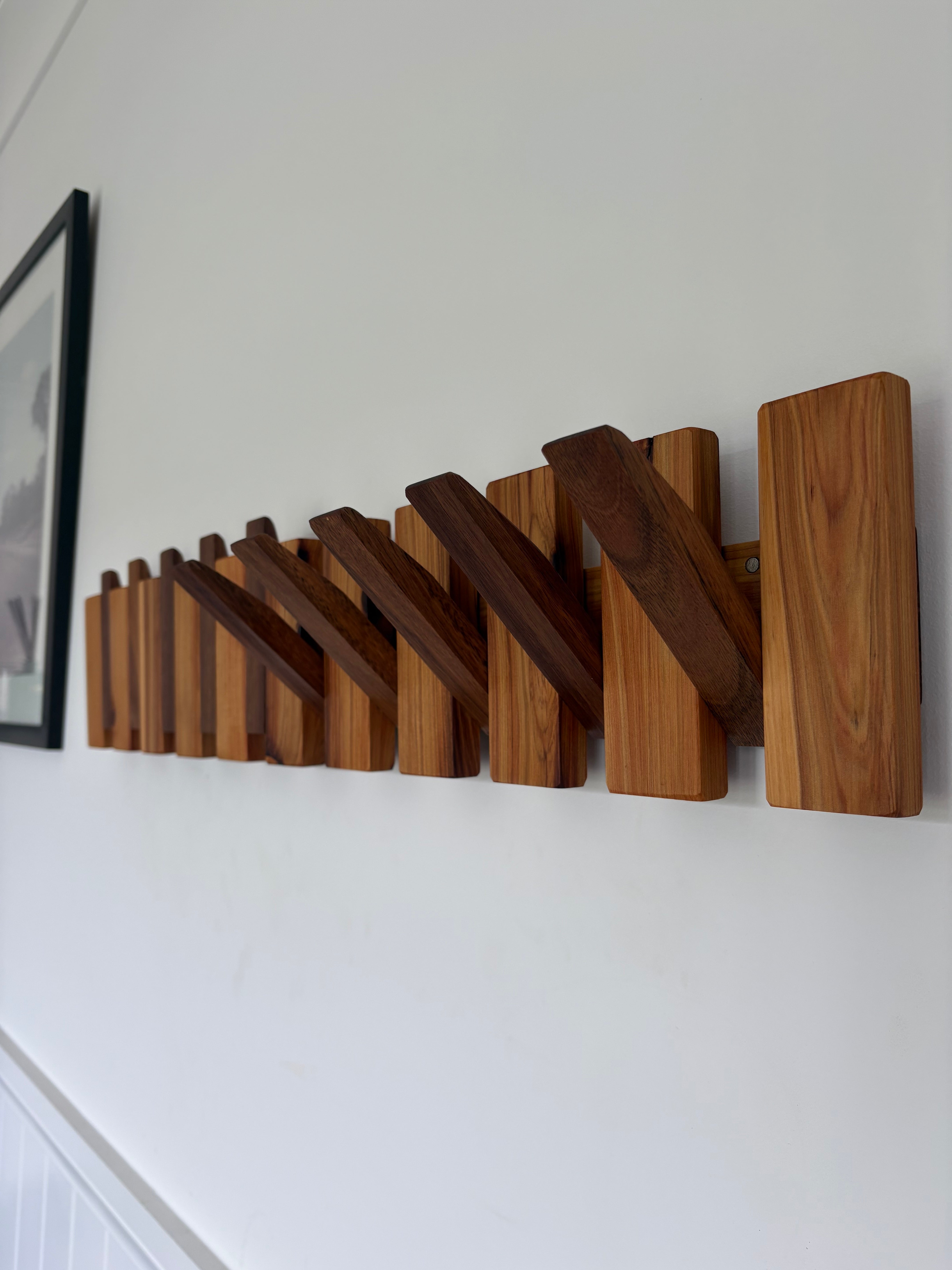 Two tone piano style coatrack