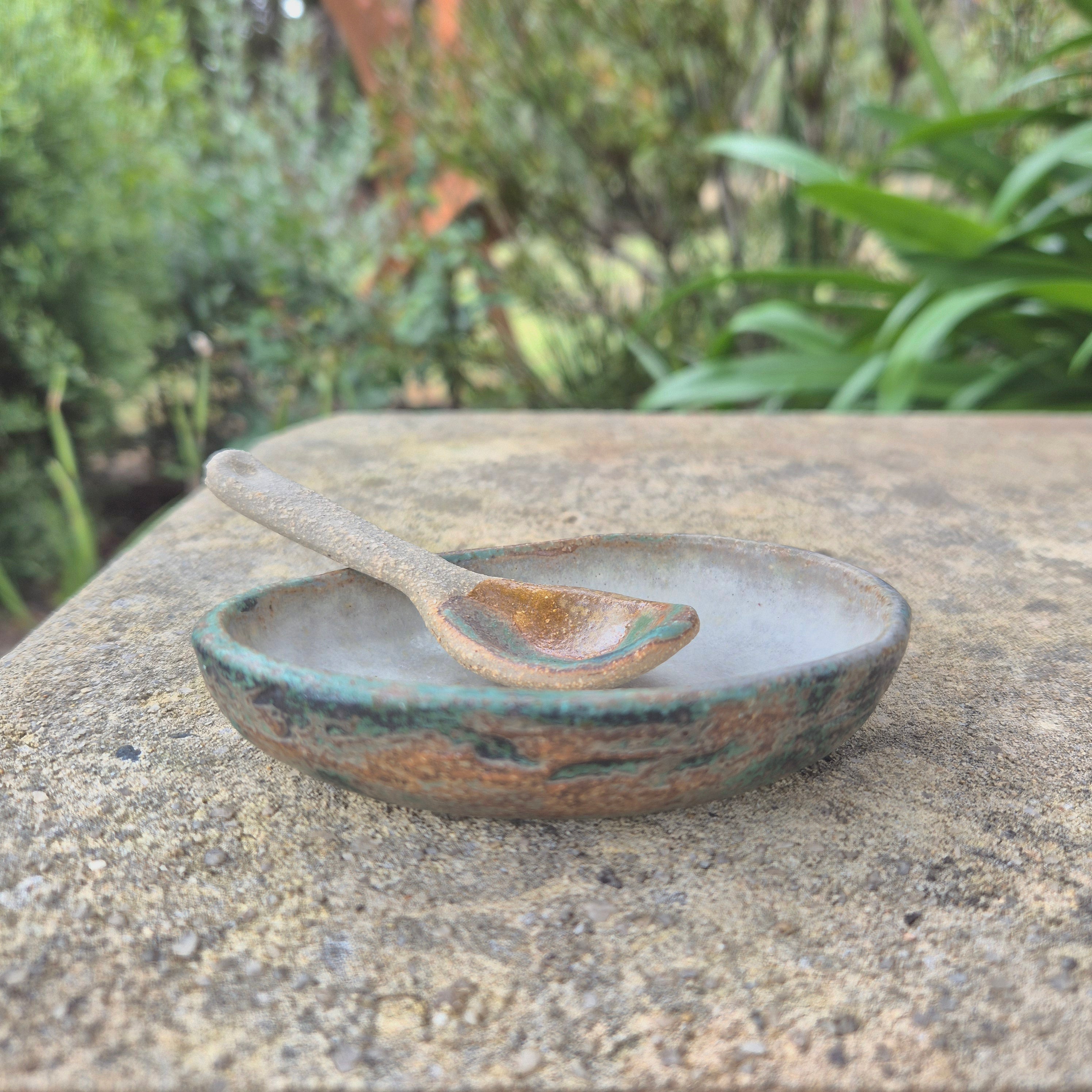 Small ceramic serving dish and spoon