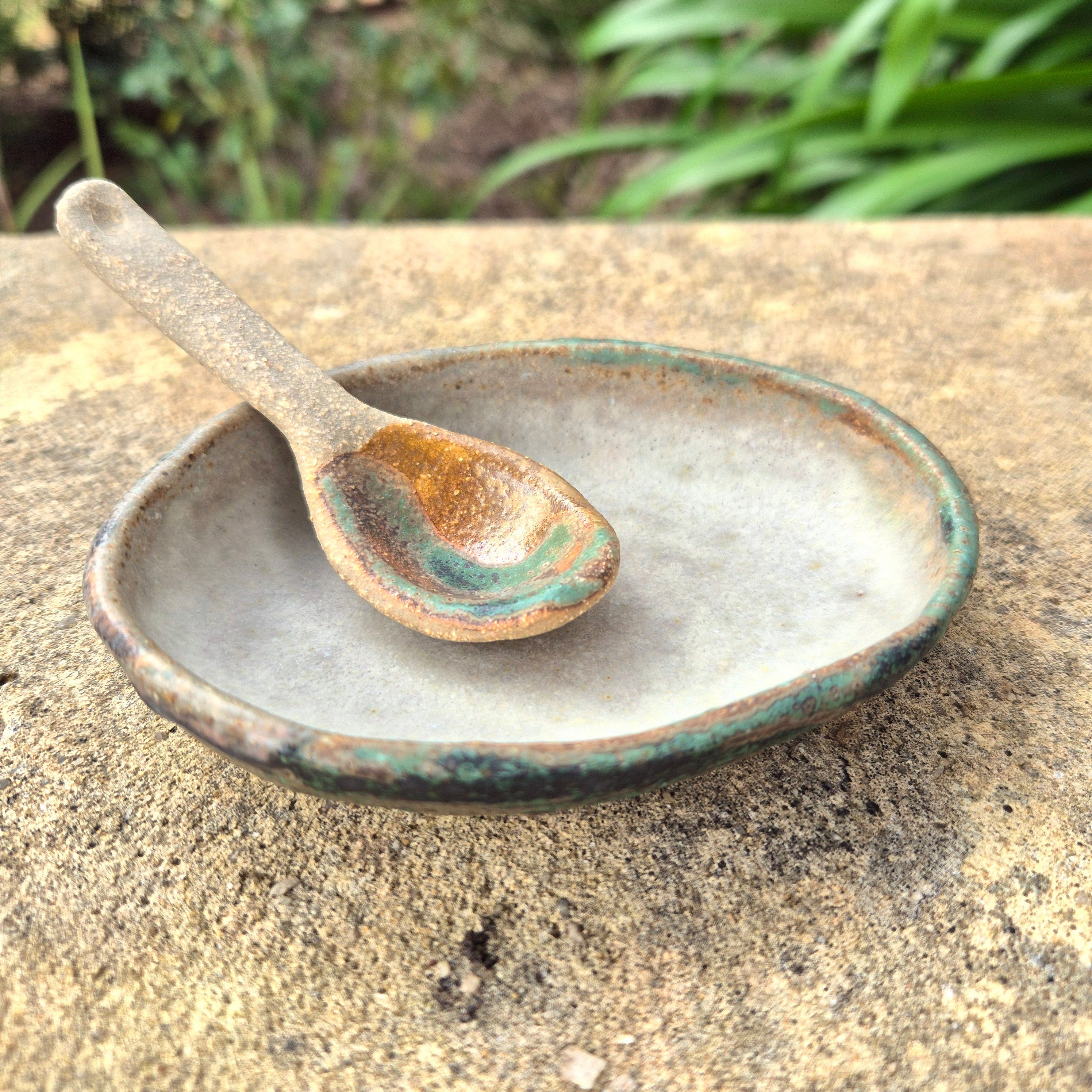 Small ceramic serving dish and spoon