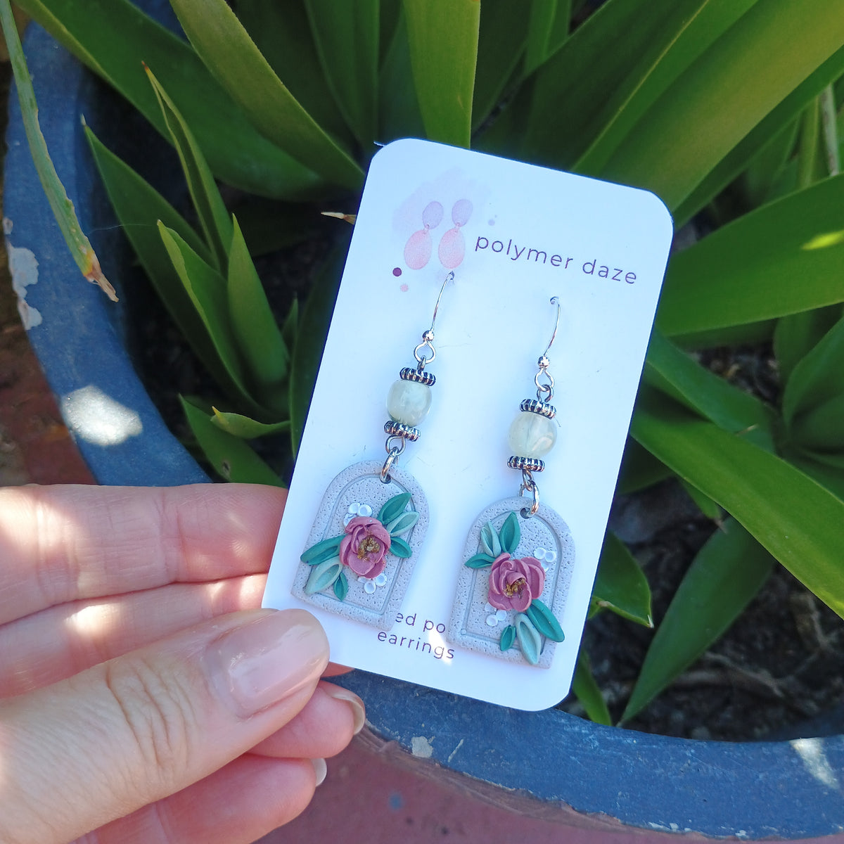 Beaded floral portrait dangle earring