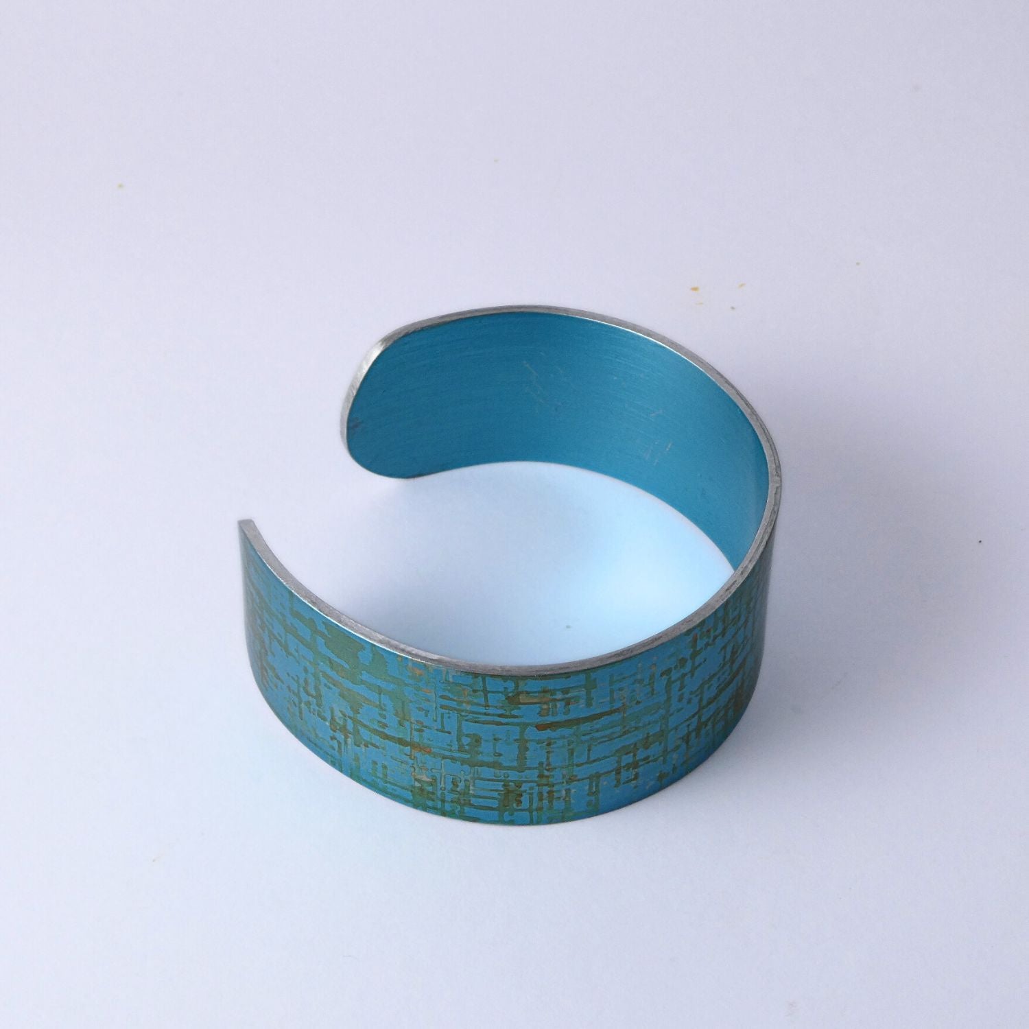 Anodized aluminium bangle hand printed Intersect Collection