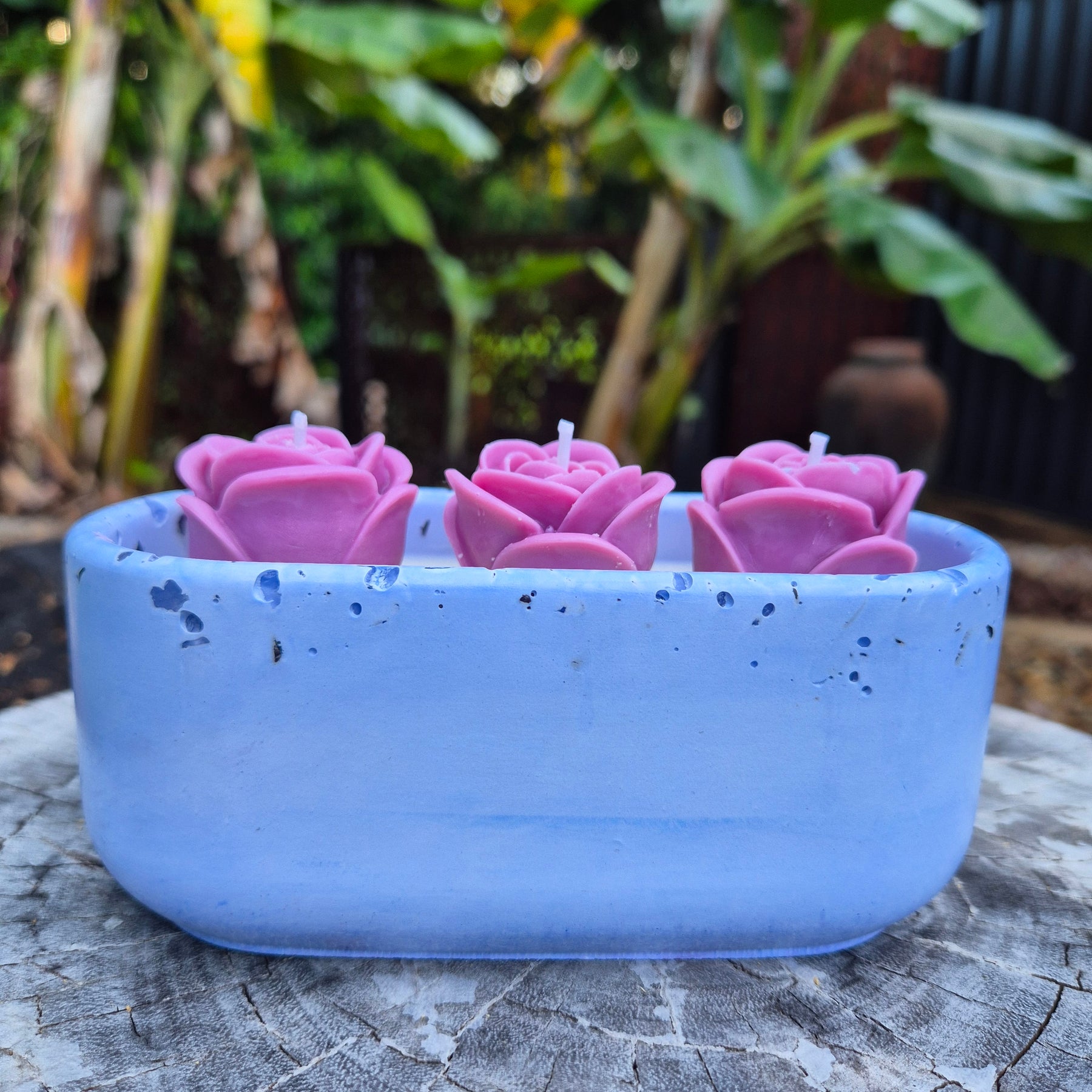 Pale blue concrete bowl candle with quartz stones and roses