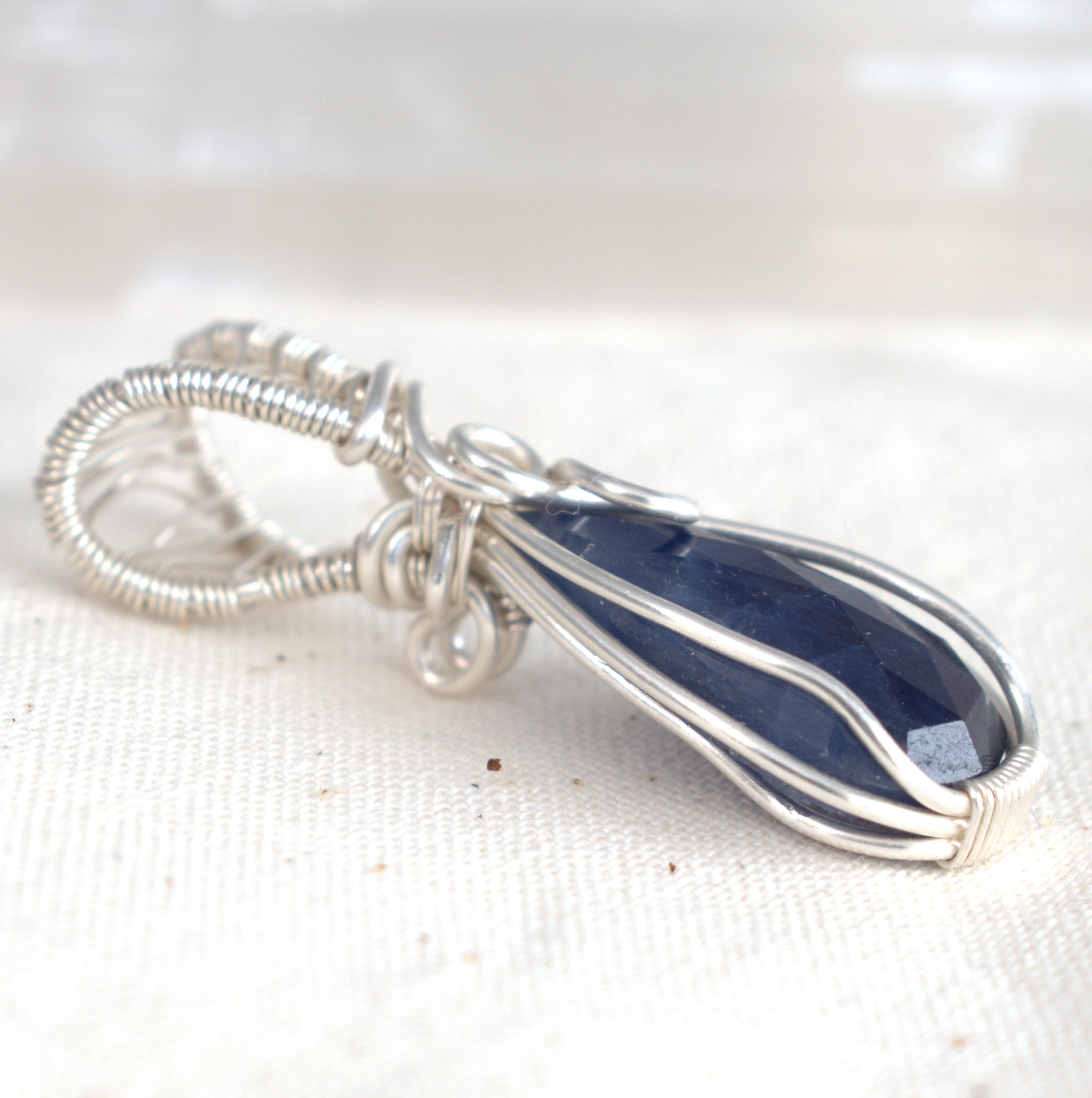 After Dark – Blue Sapphire Pendant in Silver-Filled Wire