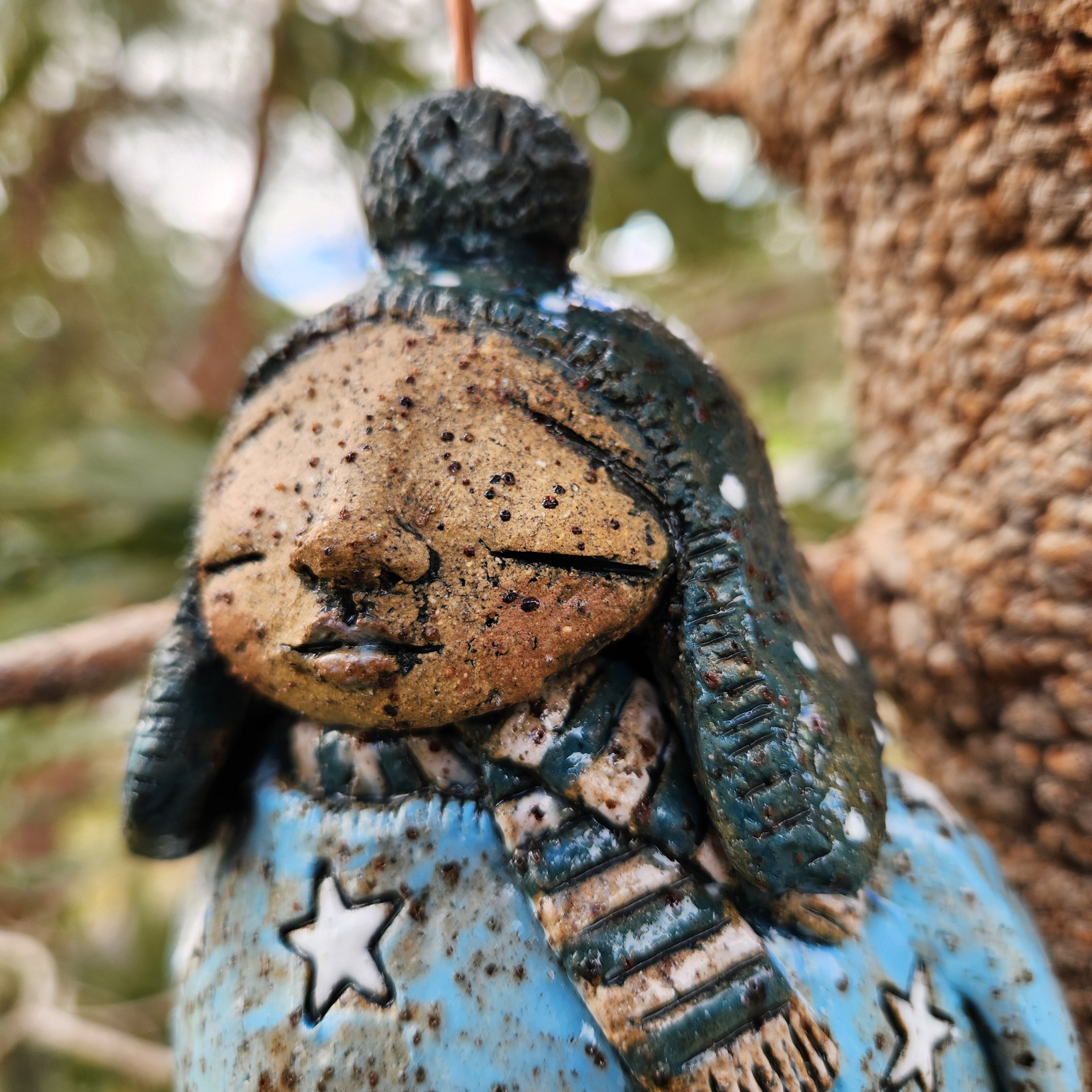 Clay windchime, little girl, stars, spots