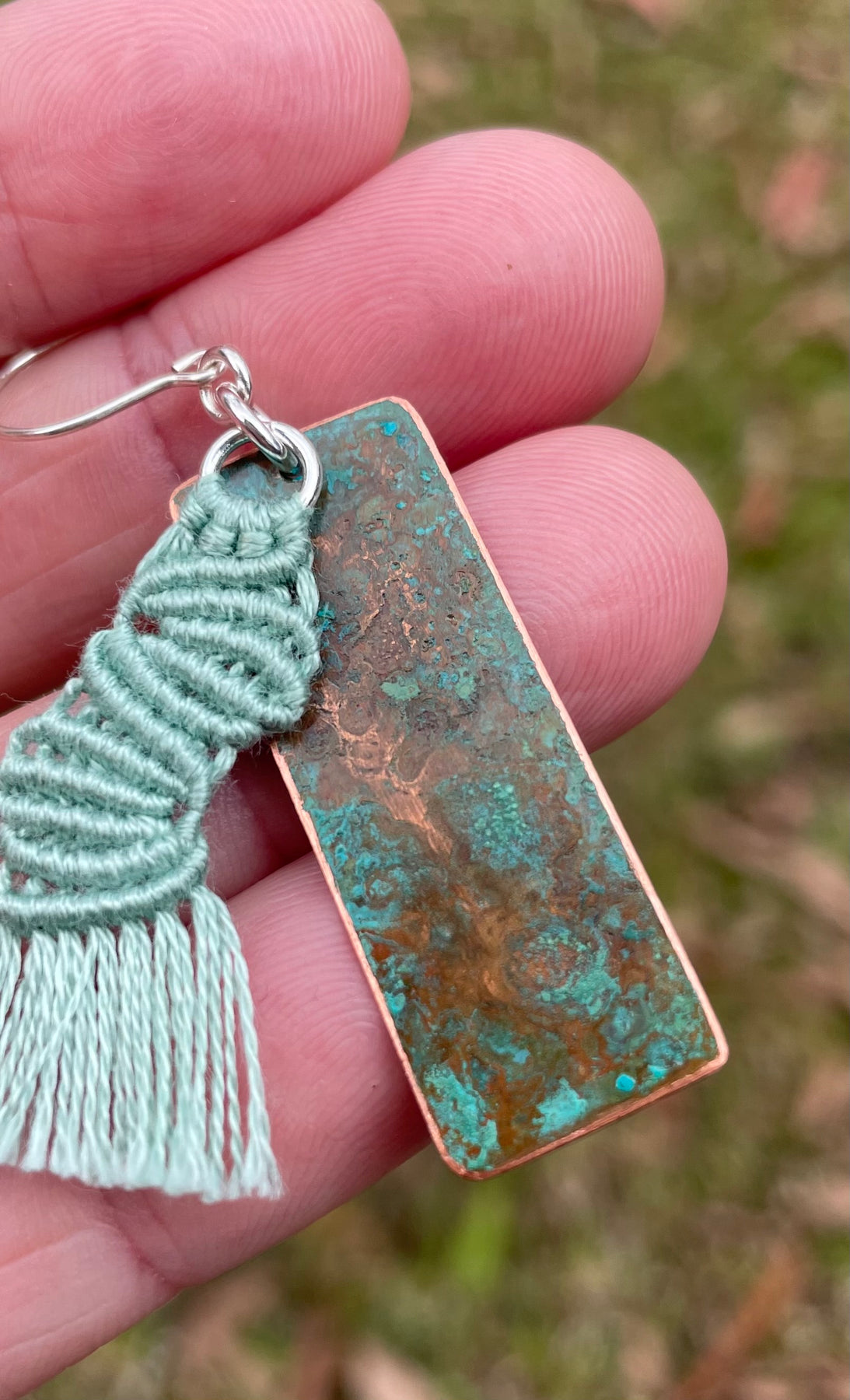 Sage green macrame thread on patinated copper