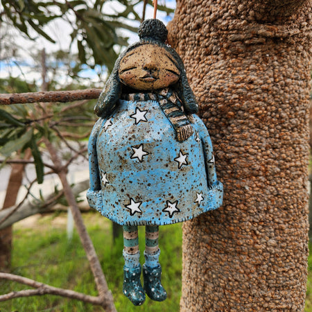Clay windchime, little girl, stars, spots