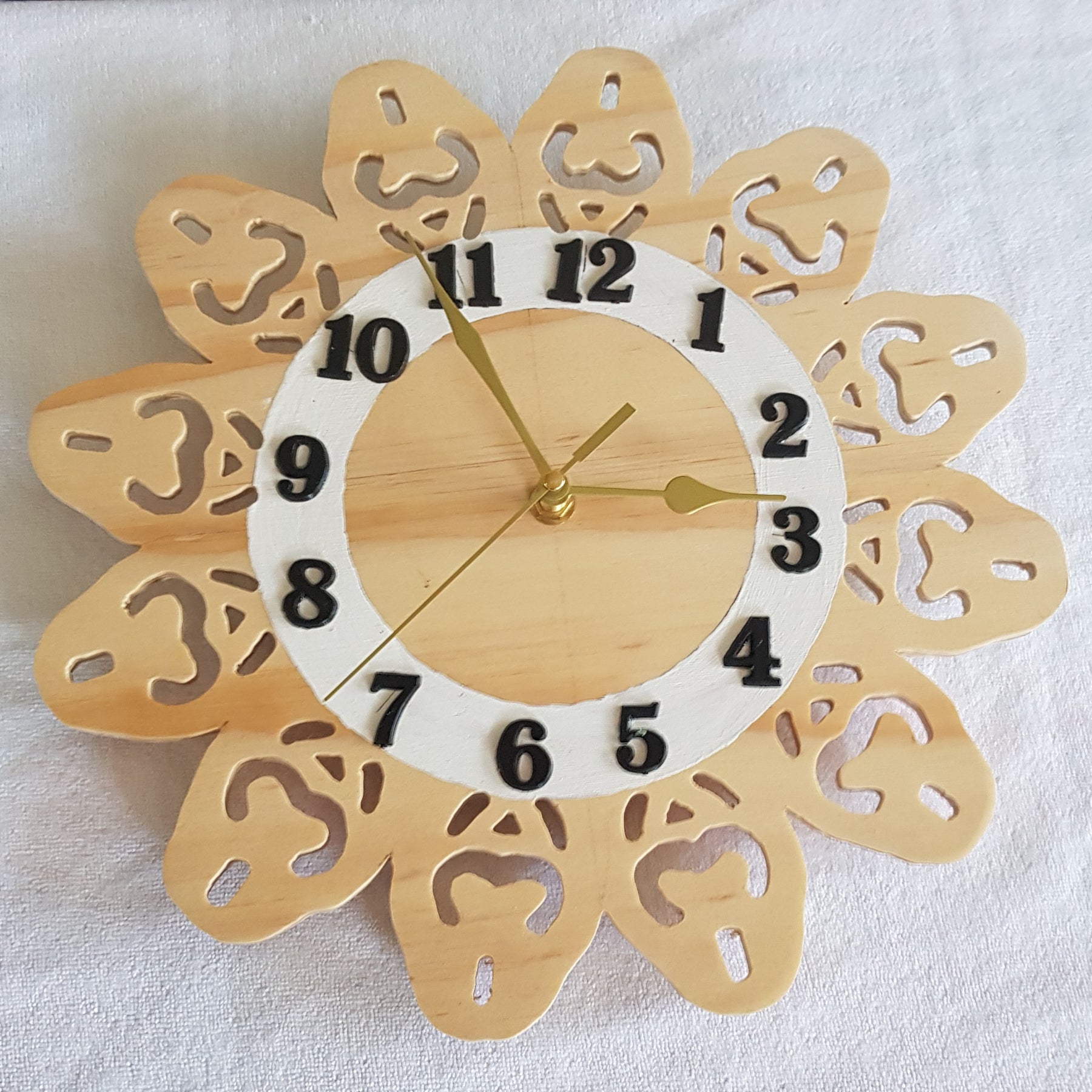 Clock 8: has a 60 scroll sawn cutout scround.