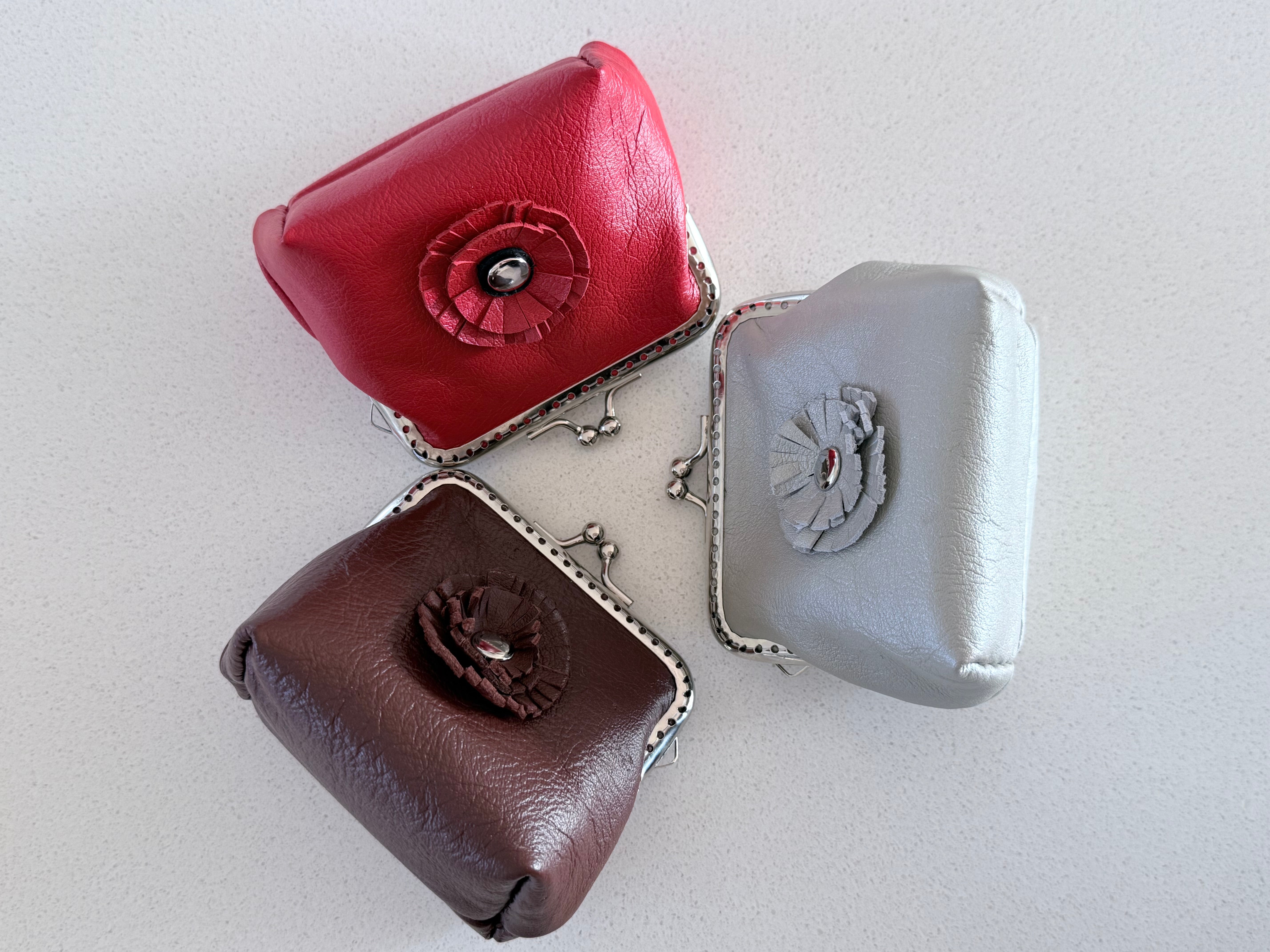 Coin purse with flower accent