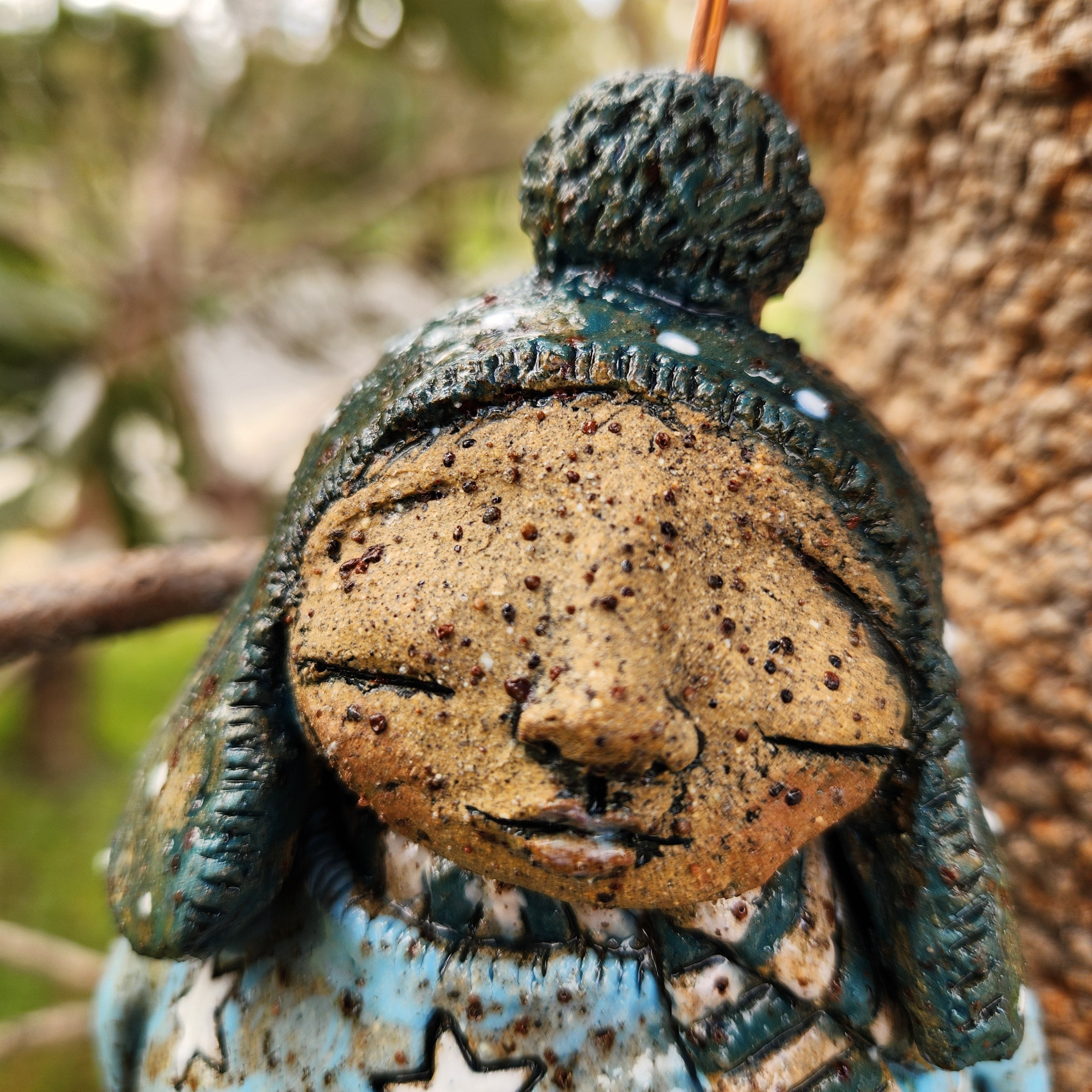Clay windchime, little girl, stars, spots