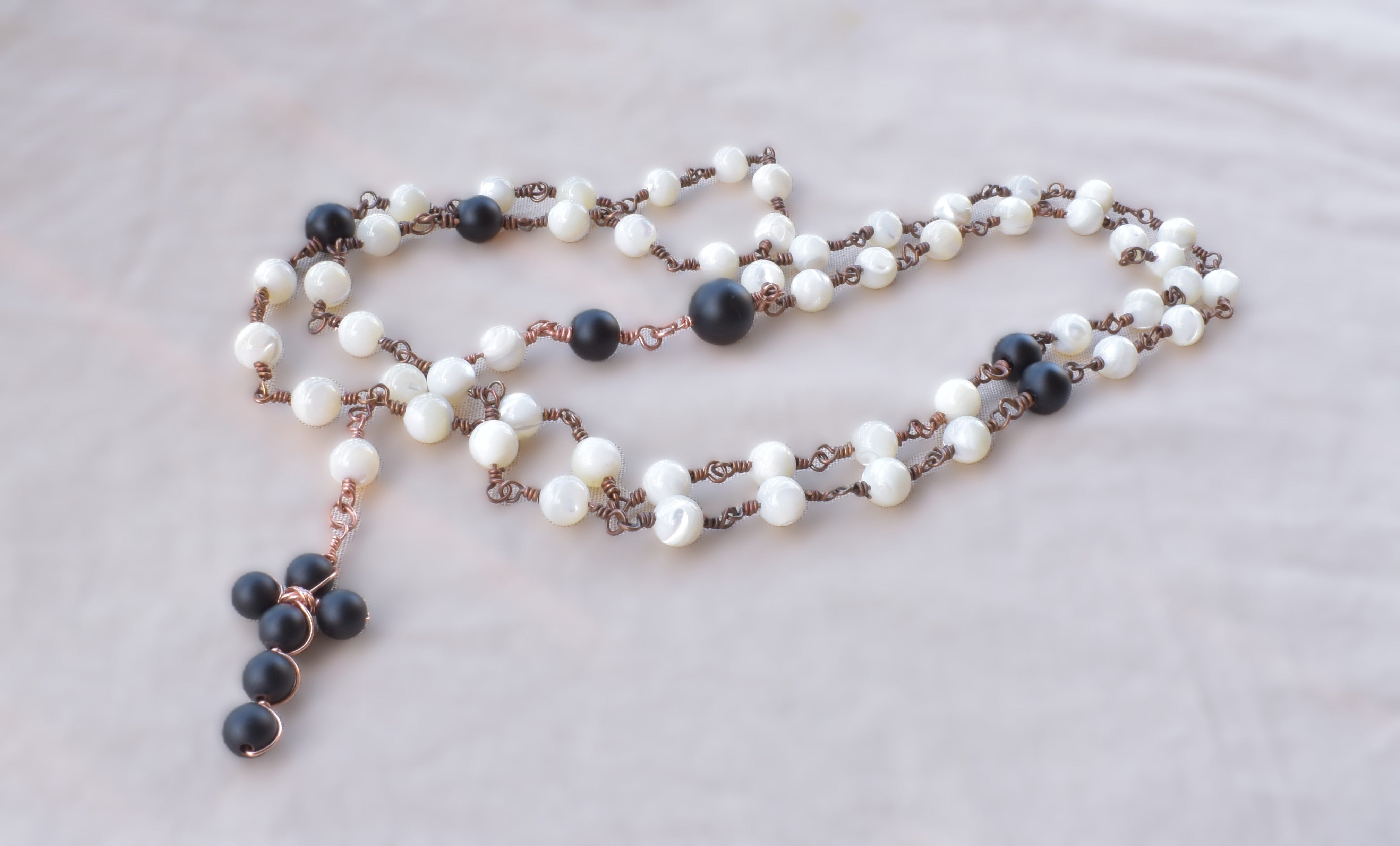 Stillness — Handcrafted Rosary in Mother of Pearl & Onyx