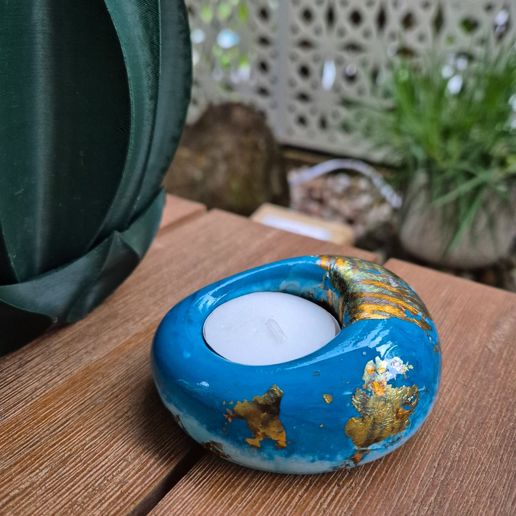 Teal and gold eco-stone pebble shaped tealight candle holder